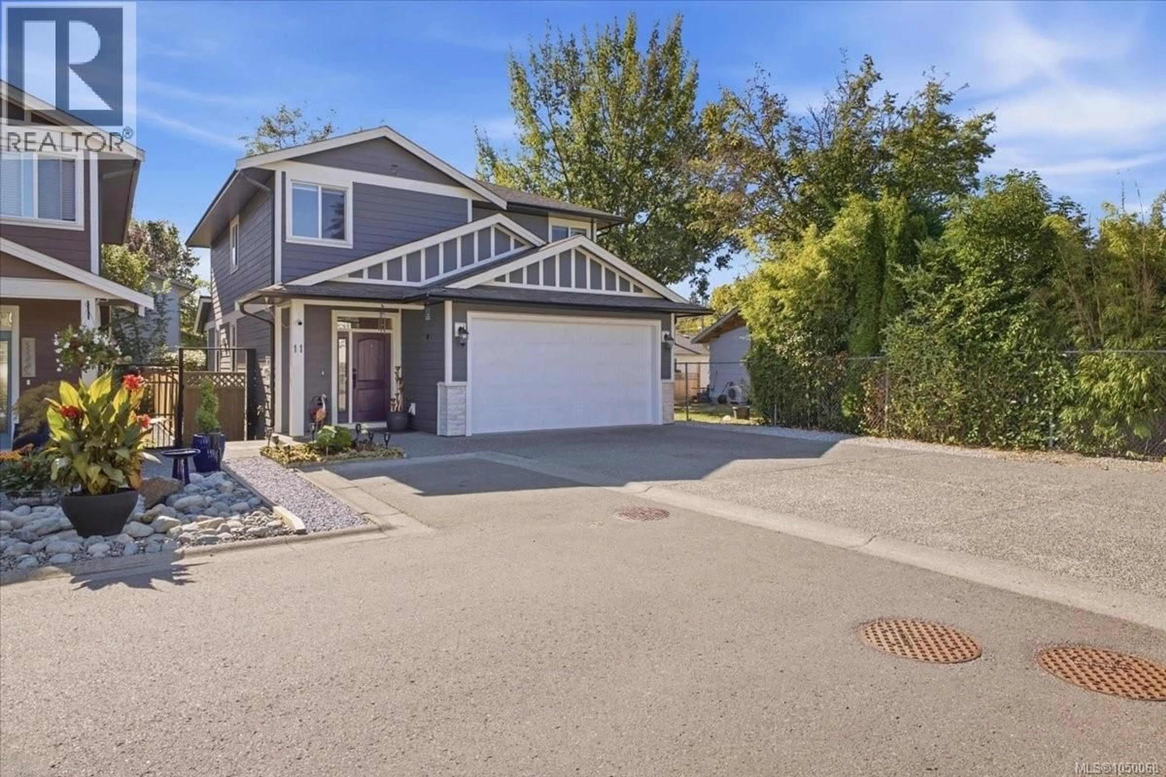 A pic from outside/outdoor area/front of a property/back of a property/a pic from drone, street for 11 - 3205 GIBBINS ROAD, Duncan British Columbia V9L1G7