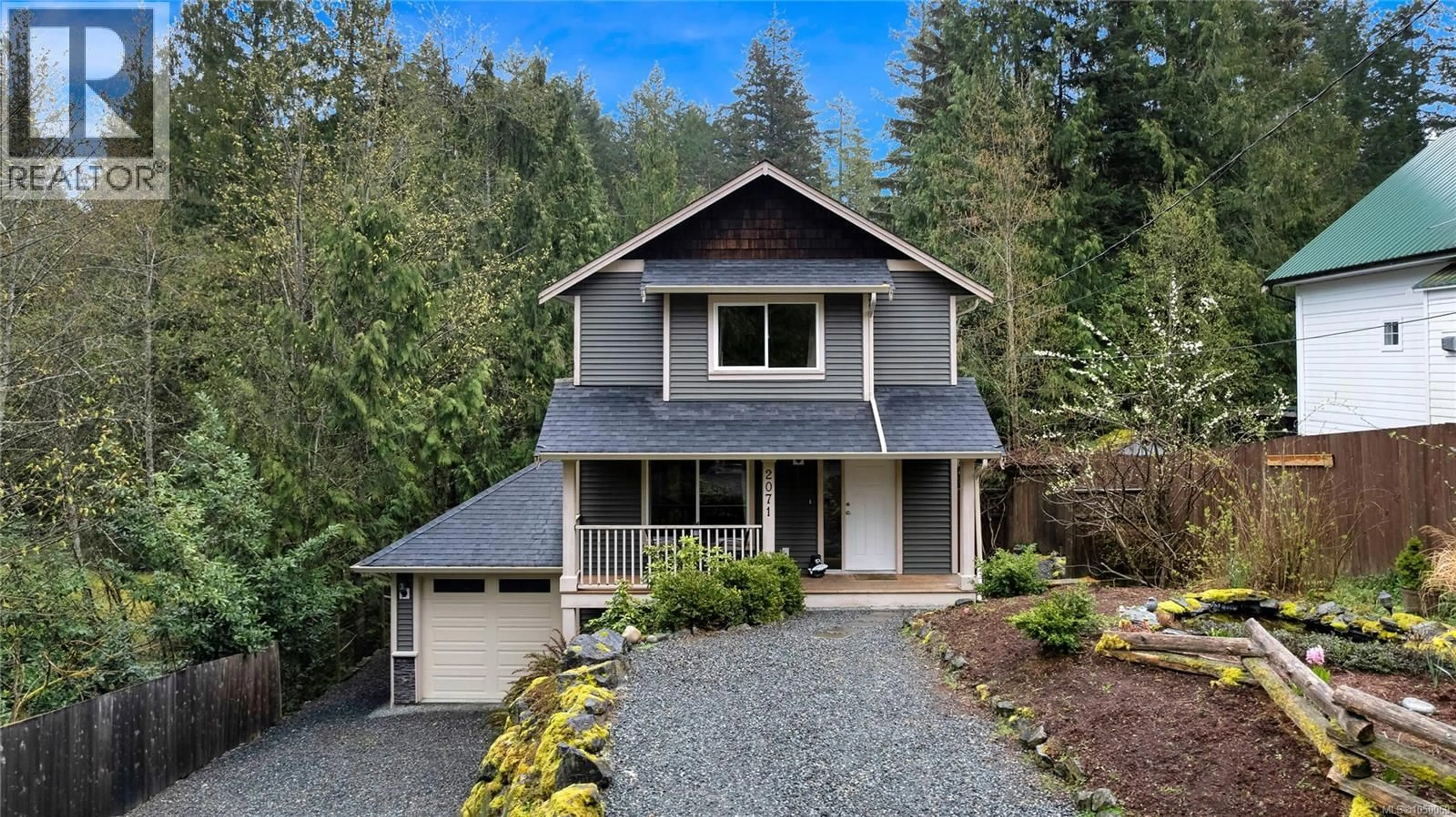 Home with vinyl exterior material, street for 2071 MABLE ROAD, Shawnigan Lake British Columbia V0R2W3