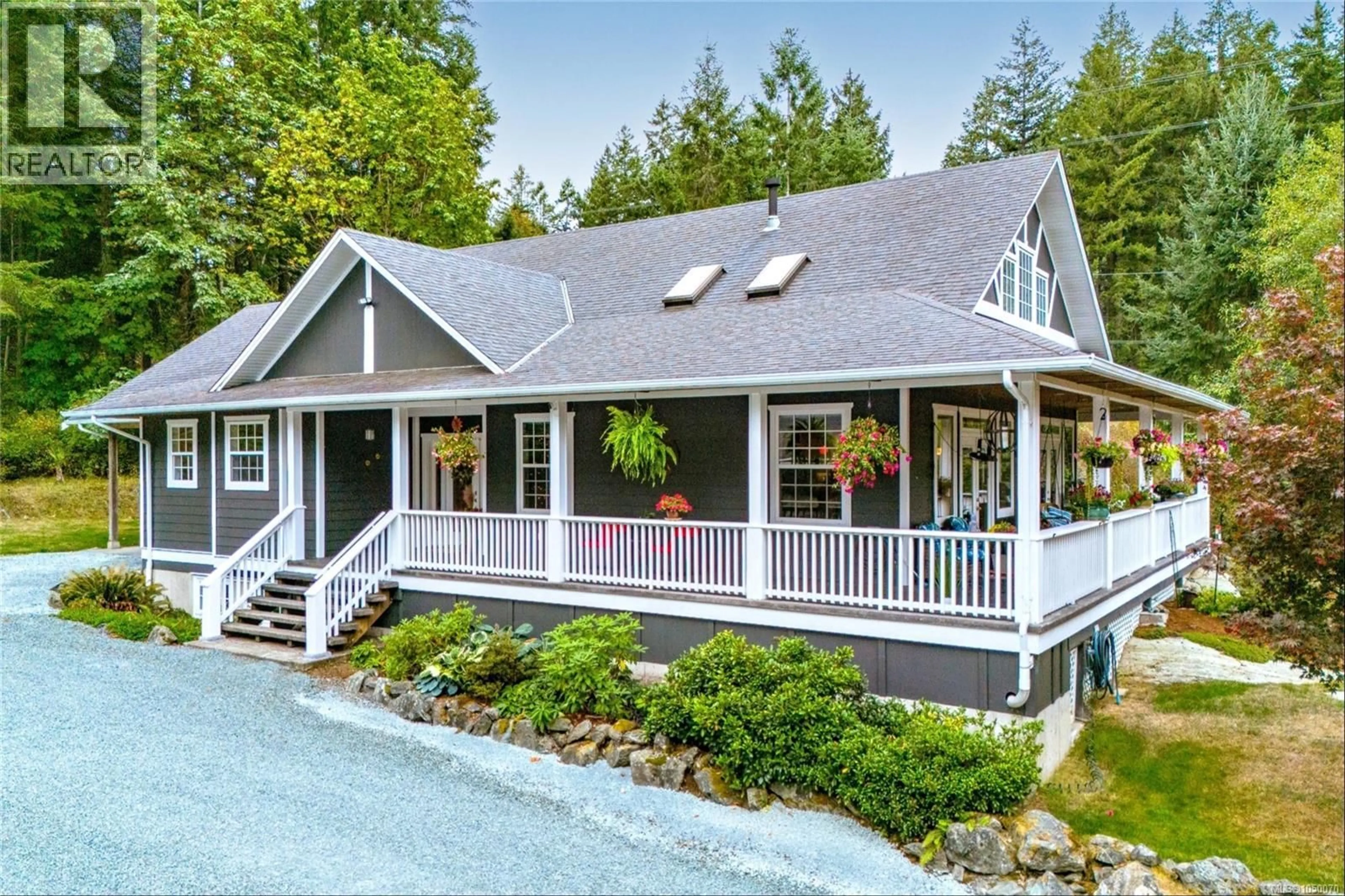 Home with vinyl exterior material, mountain view for 7285 OSBORNE BAY ROAD, Crofton British Columbia V9L5W7