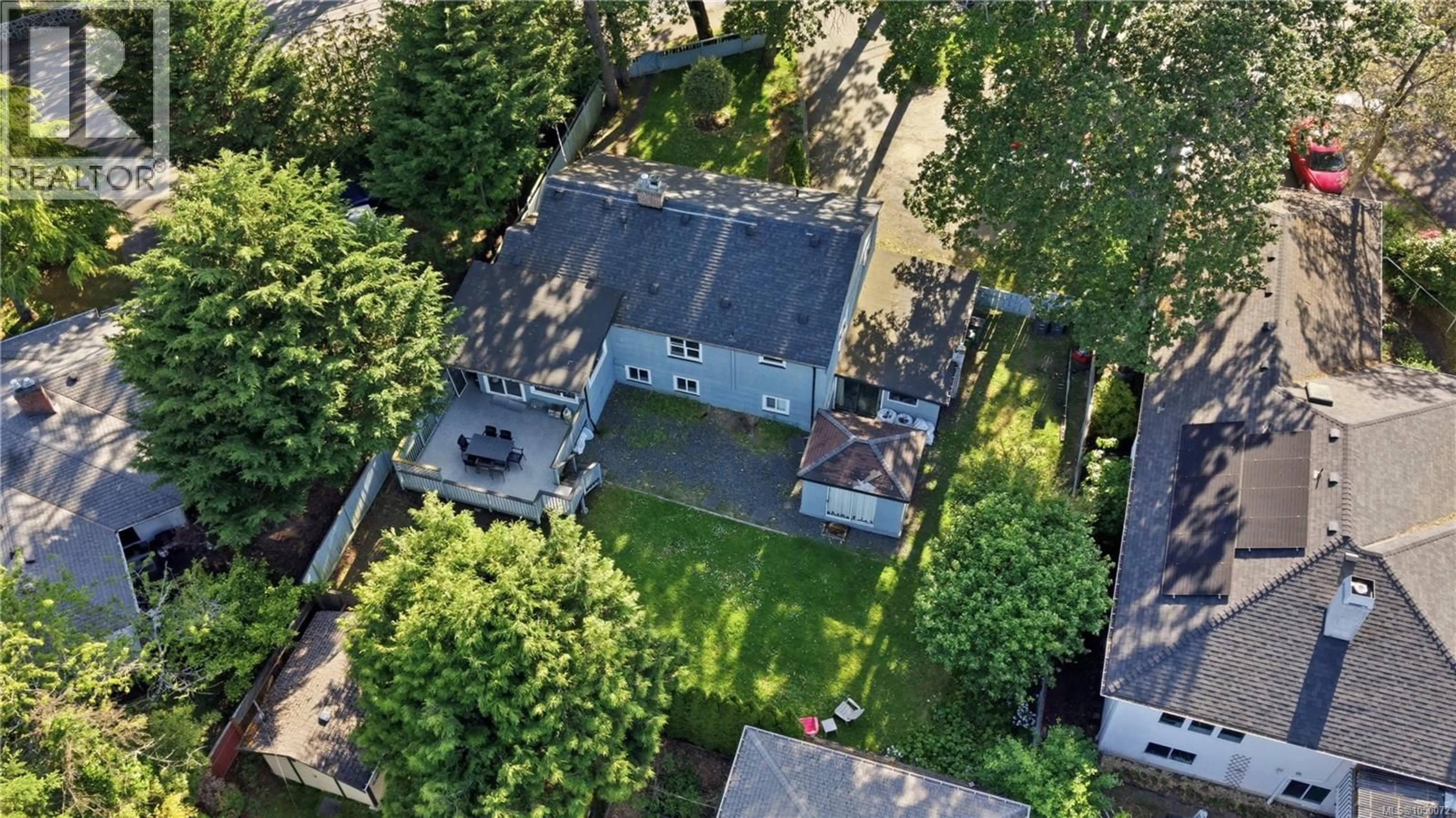 A pic from outside/outdoor area/front of a property/back of a property/a pic from drone, street for 3959 CEDAR HILL CROSS ROAD, Saanich British Columbia V8P2N8