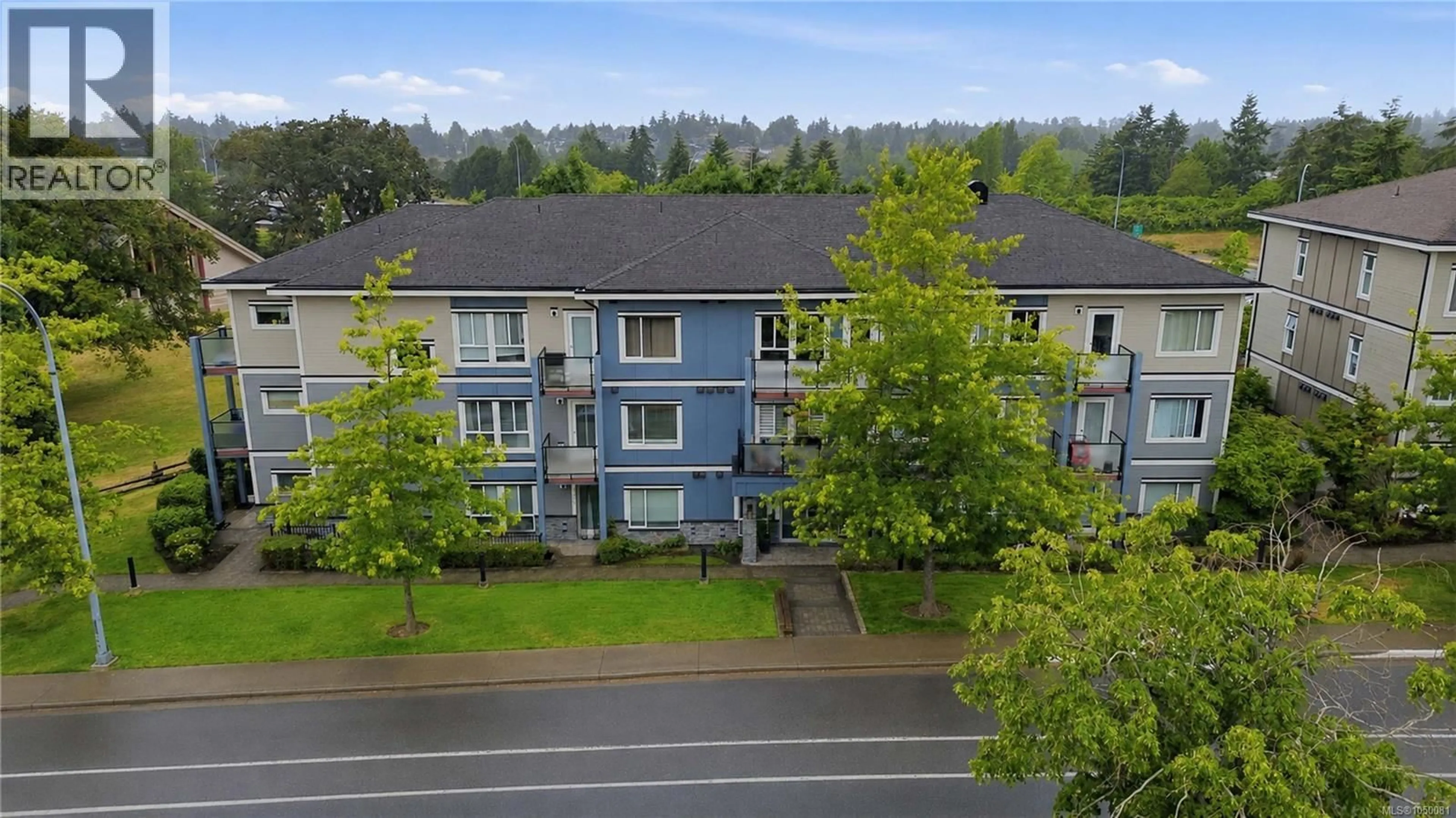 A pic from outside/outdoor area/front of a property/back of a property/a pic from drone, unknown for 203 - 4050 DOUGLAS STREET, Saanich British Columbia V8X0A5
