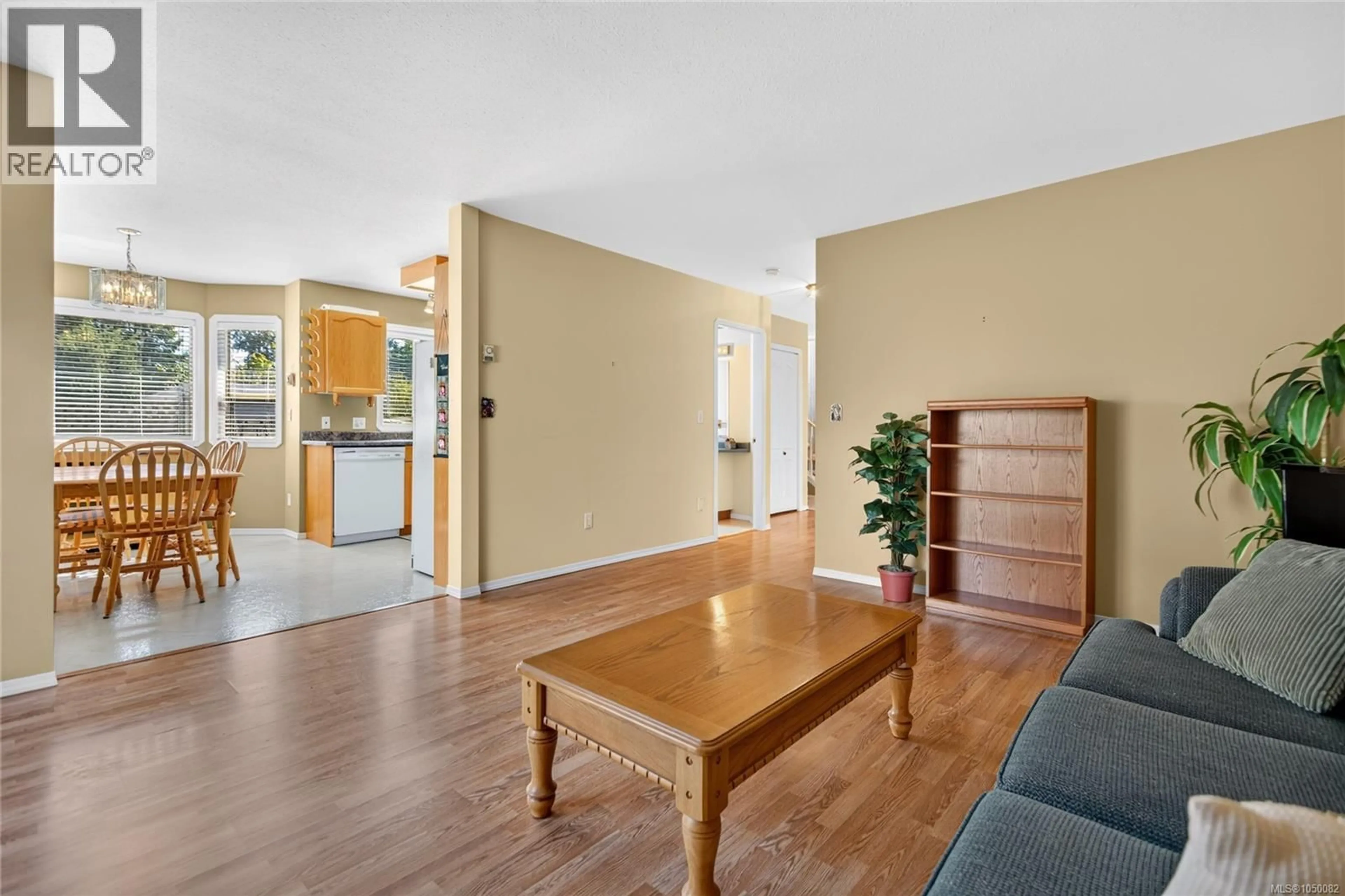 Living room with furniture, wood/laminate floor for B - 395 NIM NIM AVENUE, Courtenay British Columbia V9N5P9