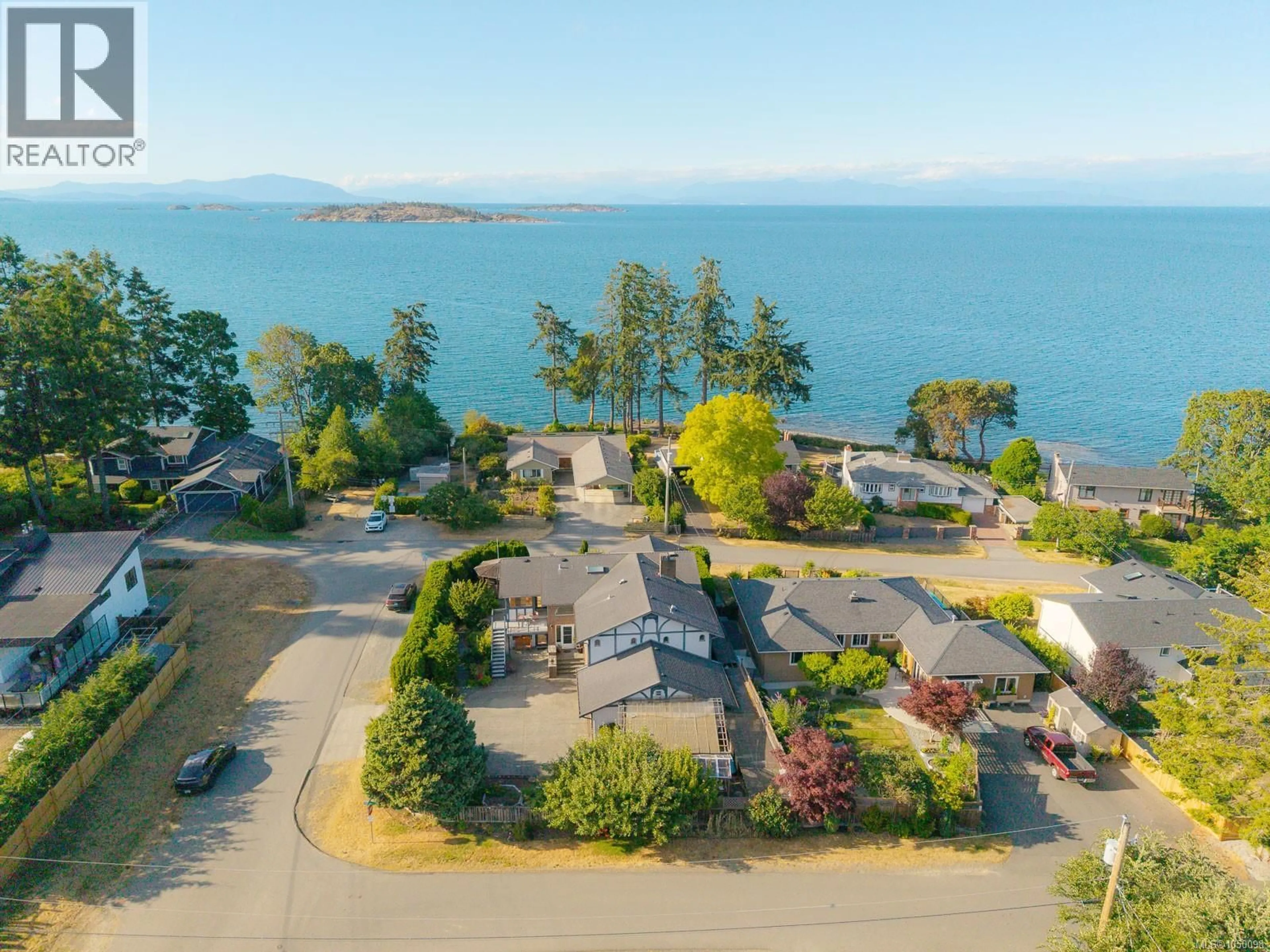 A pic from outside/outdoor area/front of a property/back of a property/a pic from drone, water/lake/river/ocean view for 7115 HUDDLESTONE ROAD, Lantzville British Columbia V0R2H0