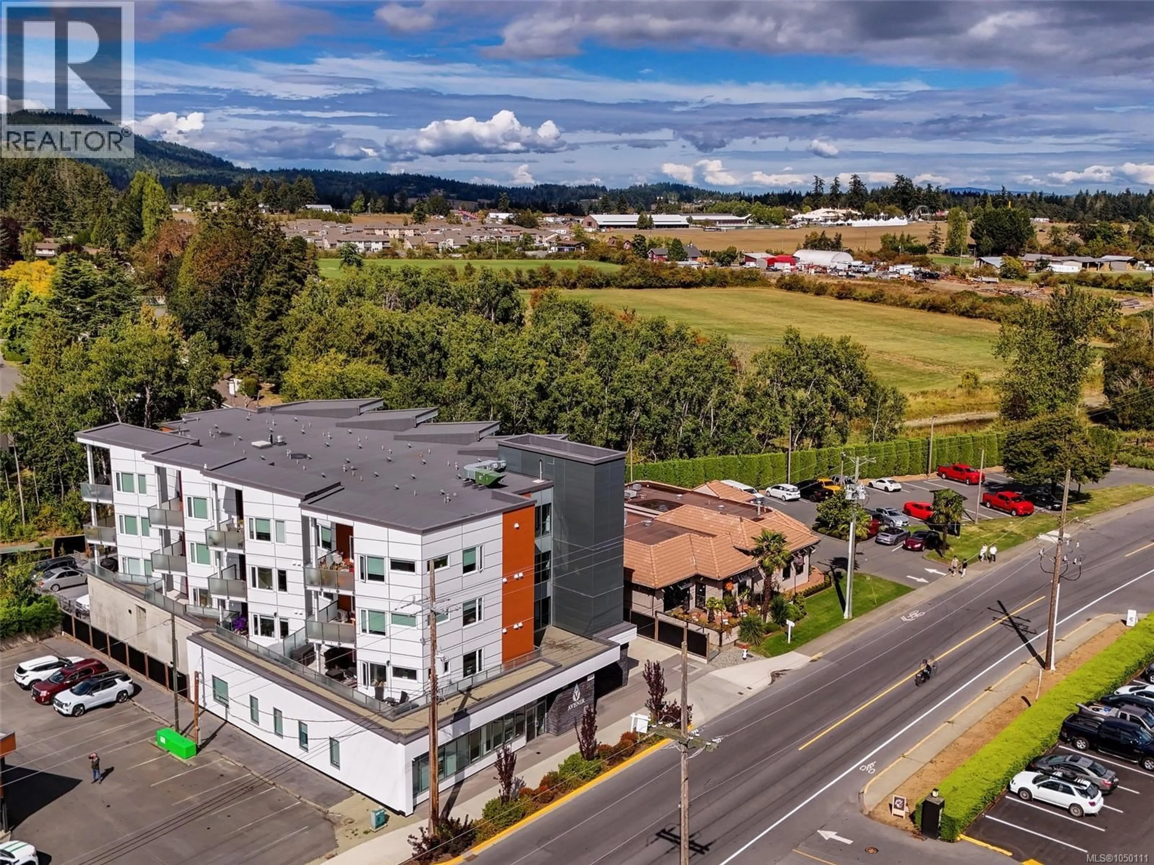 A pic from outside/outdoor area/front of a property/back of a property/a pic from drone, mountain view for 308 - 7098 WALLACE DRIVE, Central Saanich British Columbia V8M1G9