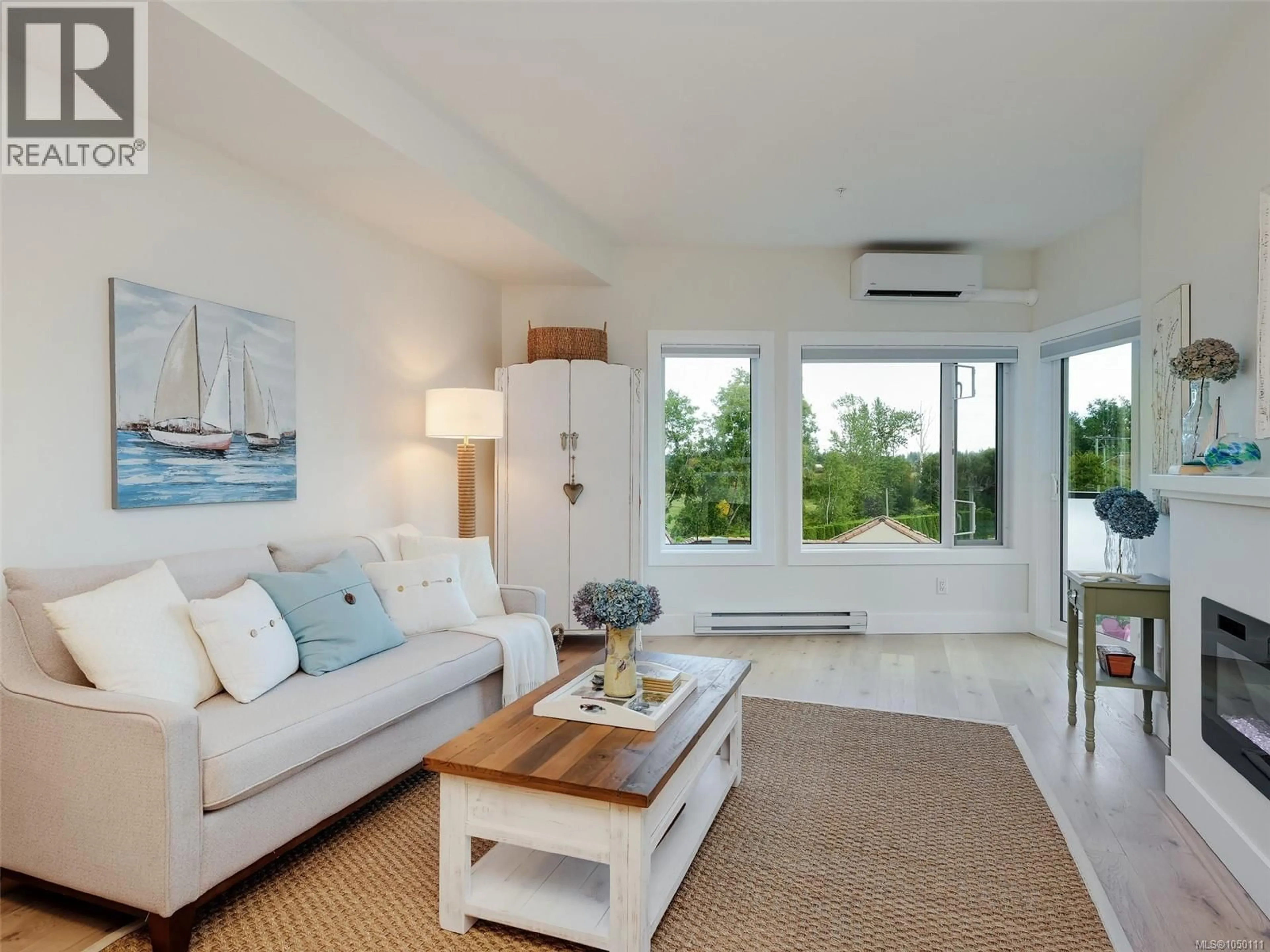 Living room with furniture, unknown for 308 - 7098 WALLACE DRIVE, Central Saanich British Columbia V8M1G9