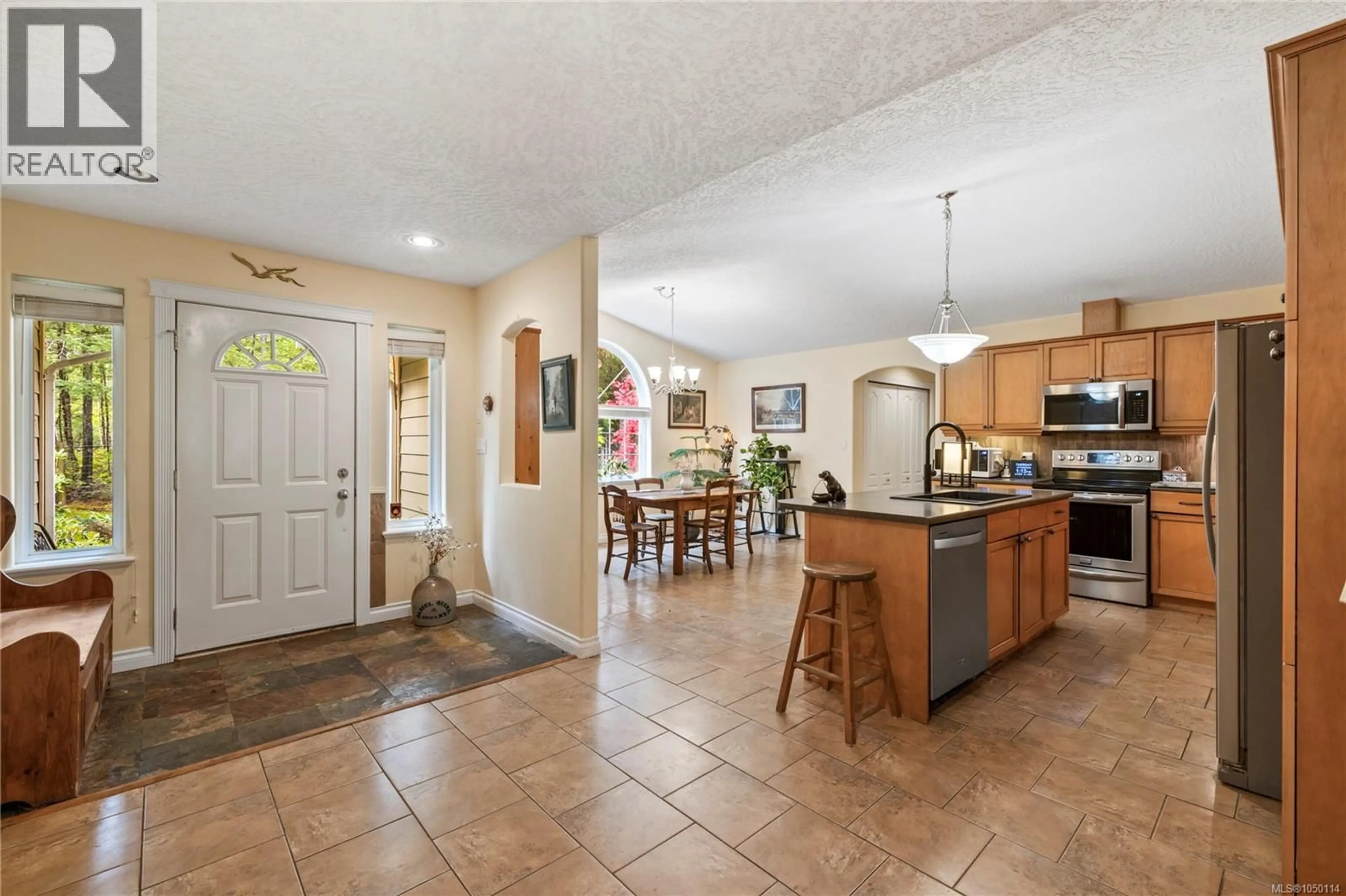 Open concept kitchen, ceramic/tile floor for 1357 MEADOWOOD WAY, Qualicum Beach British Columbia V9K2S4