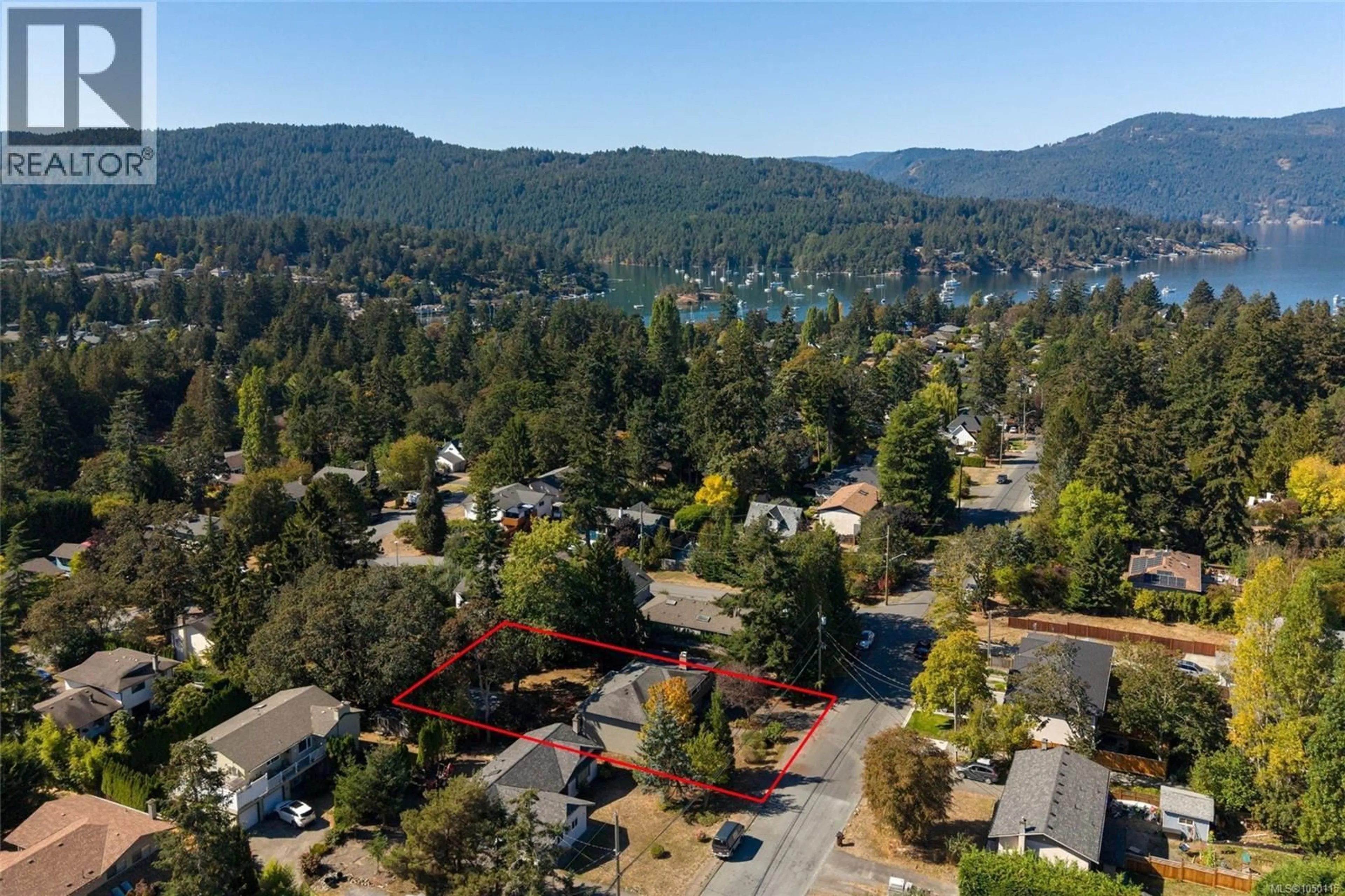 A pic from outside/outdoor area/front of a property/back of a property/a pic from drone, forest/trees view for 1055 CLARKE ROAD, Central Saanich British Columbia V8M1C7