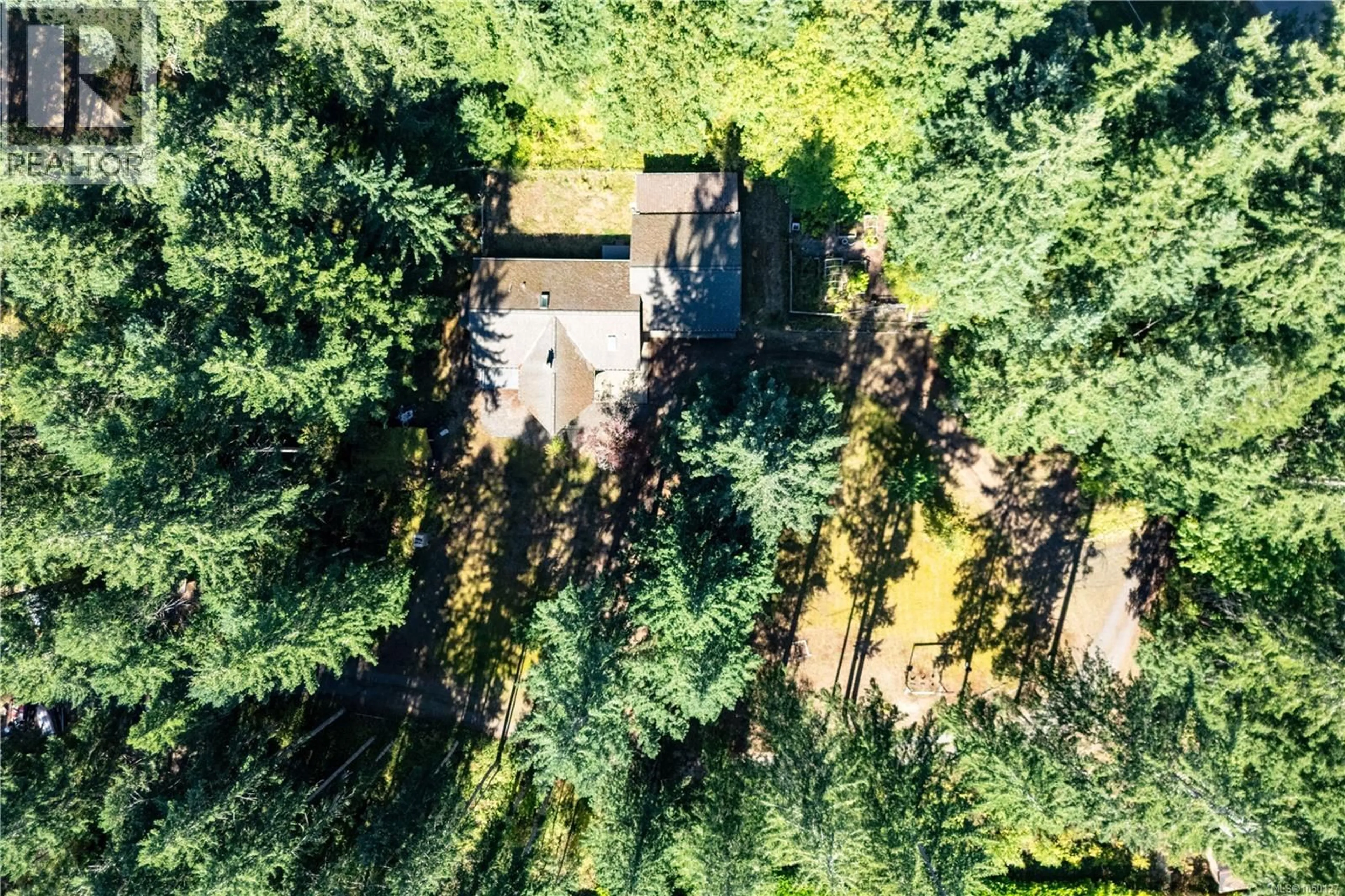 A pic from outside/outdoor area/front of a property/back of a property/a pic from drone, forest/trees view for 9498 DOYLE ROAD, Black Creek British Columbia V9J1E7