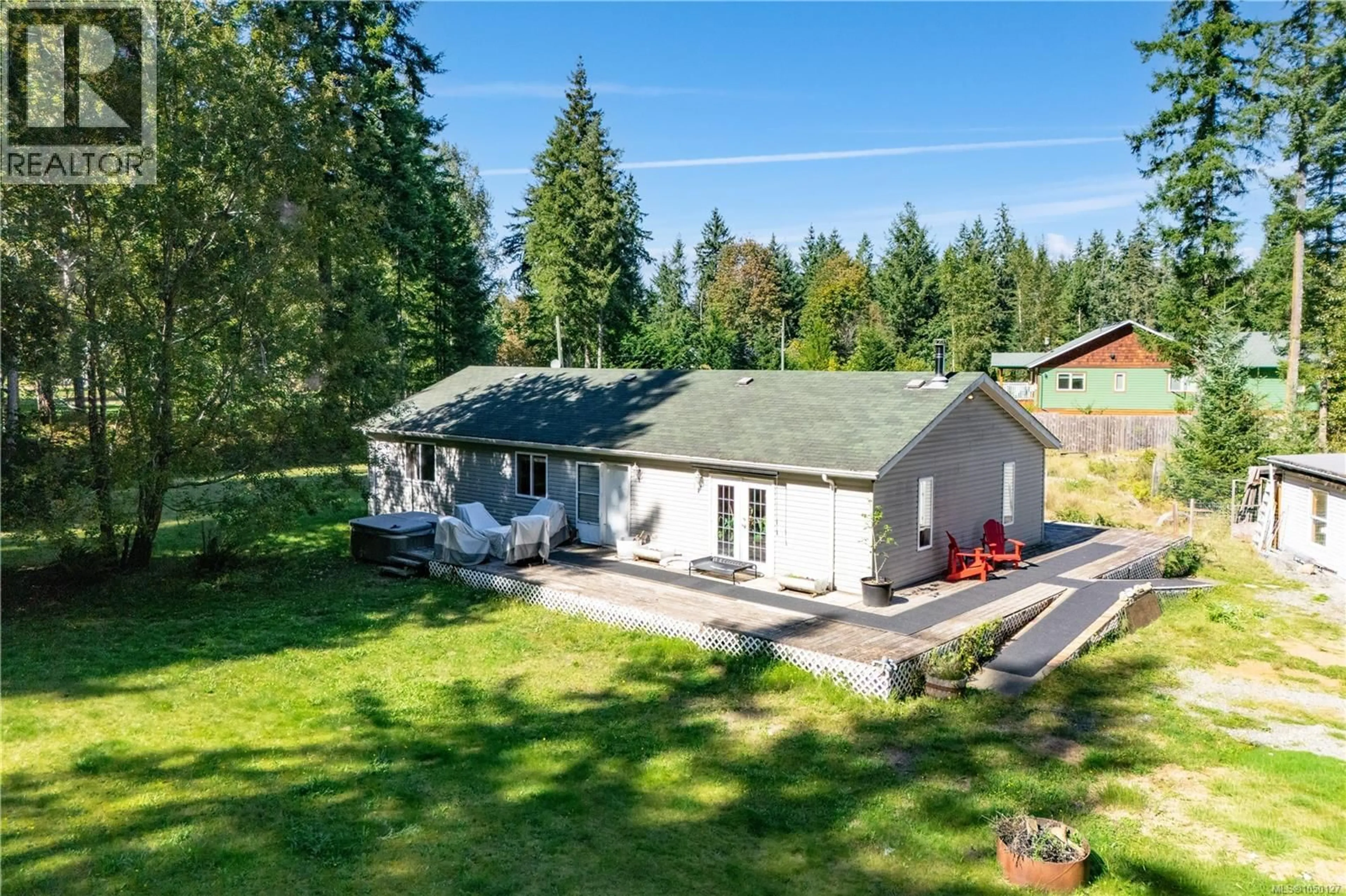 A pic from outside/outdoor area/front of a property/back of a property/a pic from drone, unknown for 9498 DOYLE ROAD, Black Creek British Columbia V9J1E7