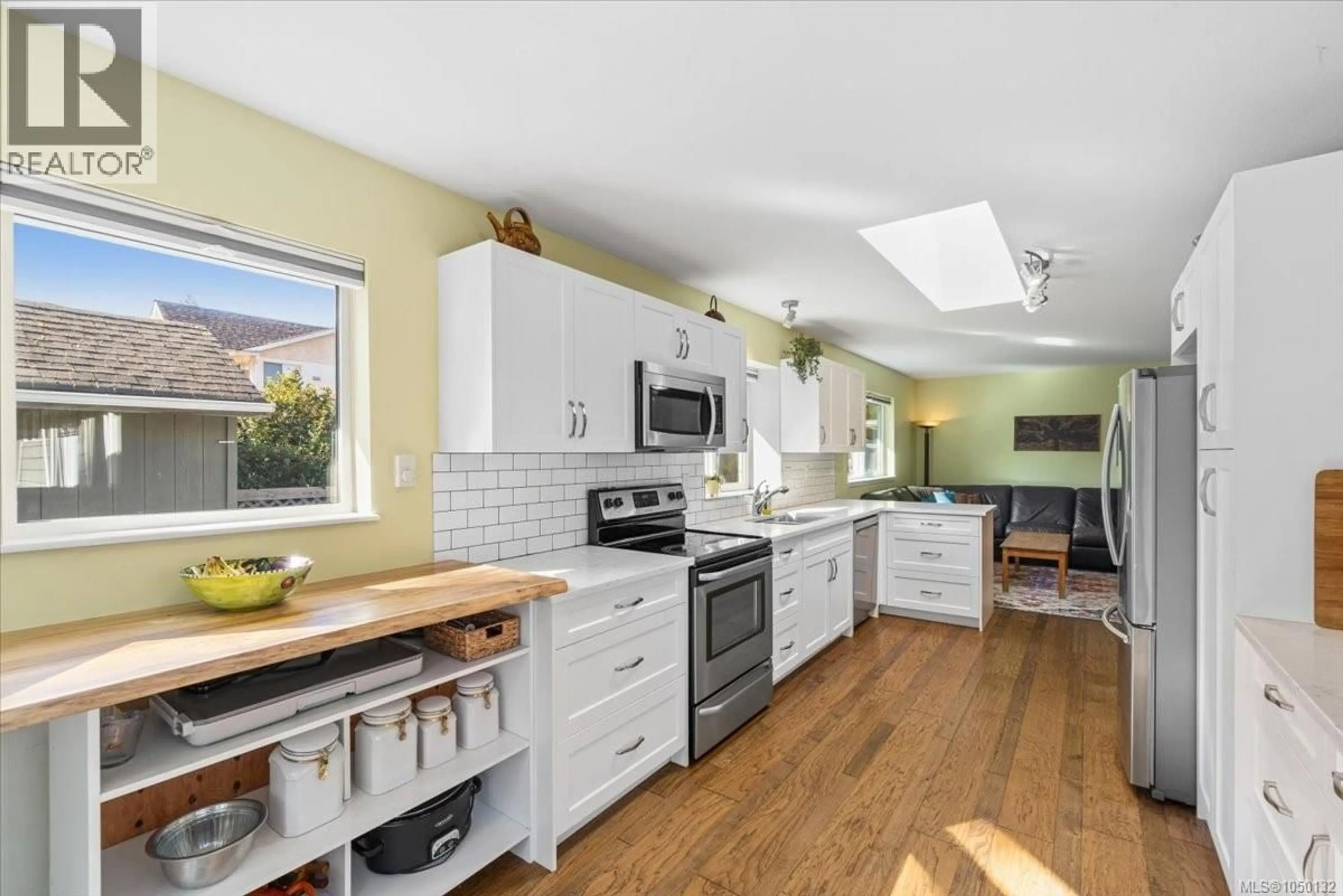 Open concept kitchen, ceramic/tile floor for 620 SPRUCE STREET, Qualicum Beach British Columbia V9K1J1