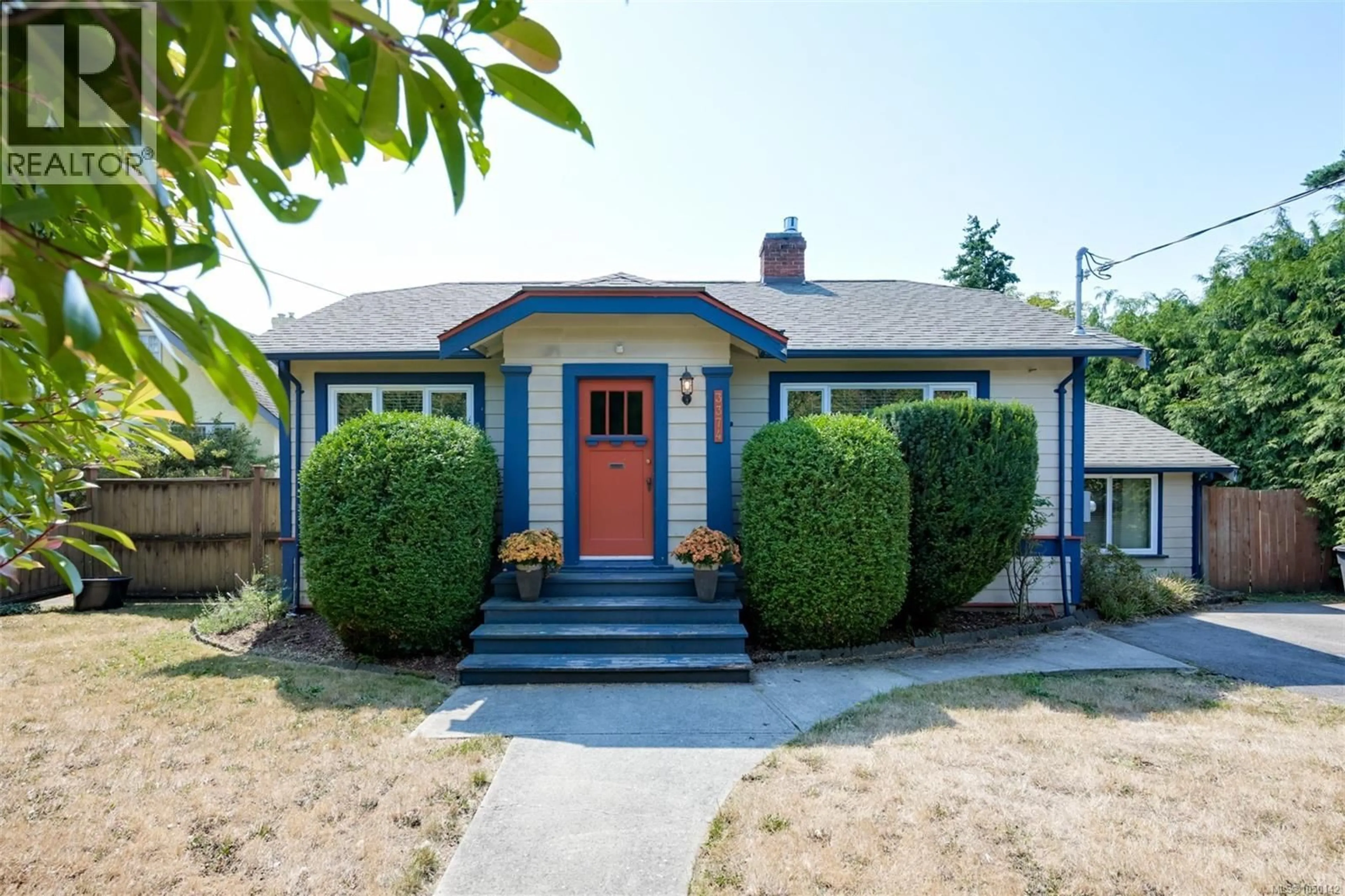 Home with vinyl exterior material, street for 3374 COOK STREET, Saanich British Columbia V8X1A8