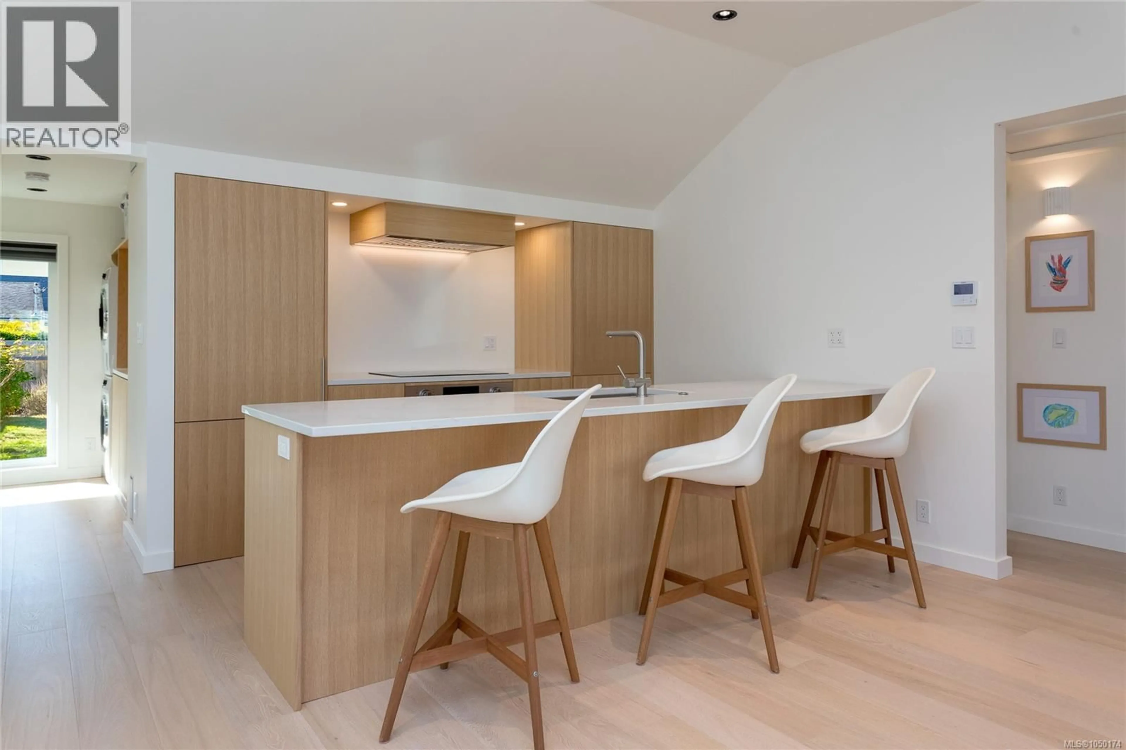 Contemporary kitchen, wood/laminate floor for 9646 FIFTH STREET, Sidney British Columbia V8L2W6