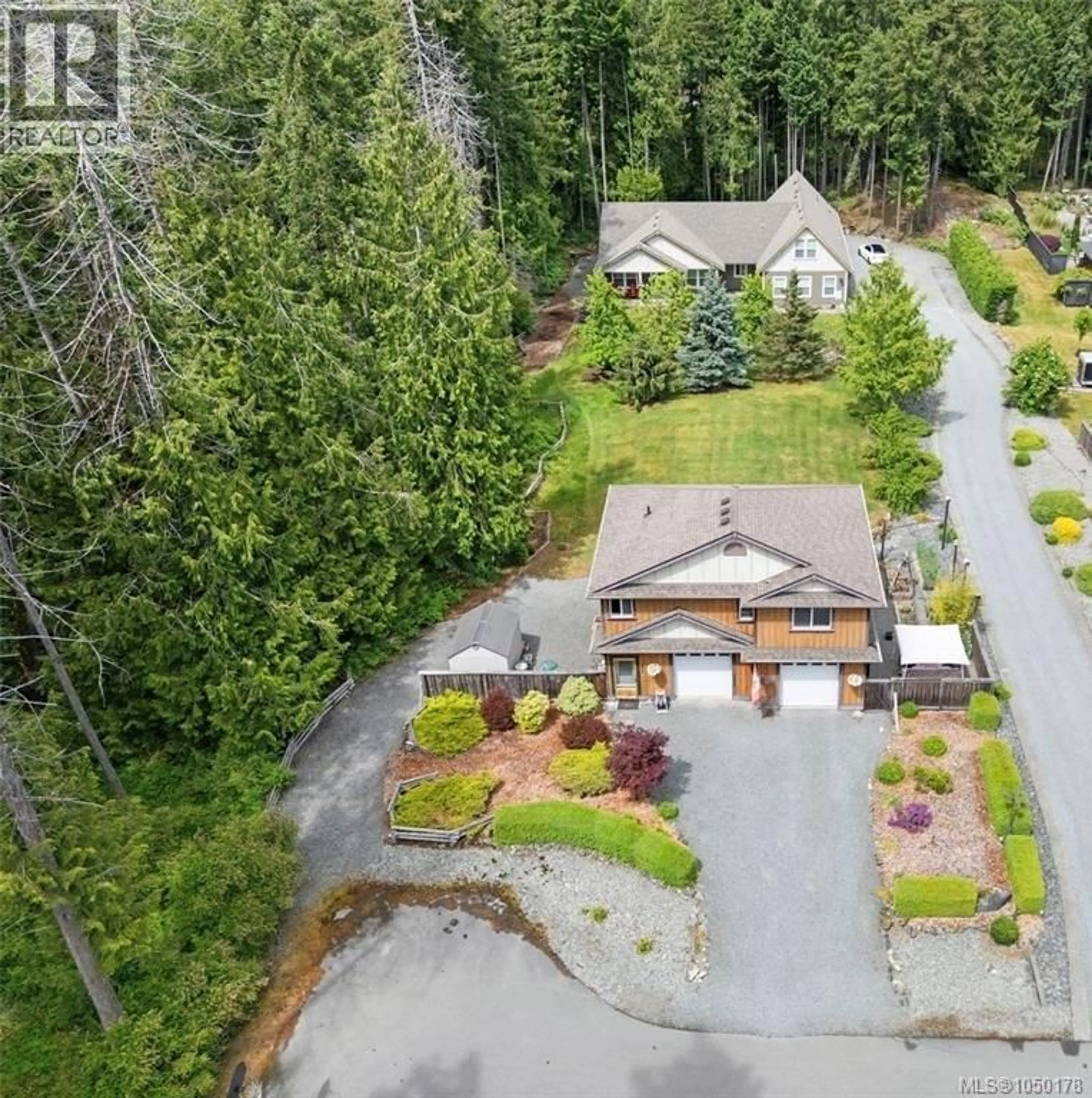 A pic from outside/outdoor area/front of a property/back of a property/a pic from drone, unknown for 1871 HIGHLAND RIDGE ROAD, Shawnigan Lake British Columbia V8H2H9