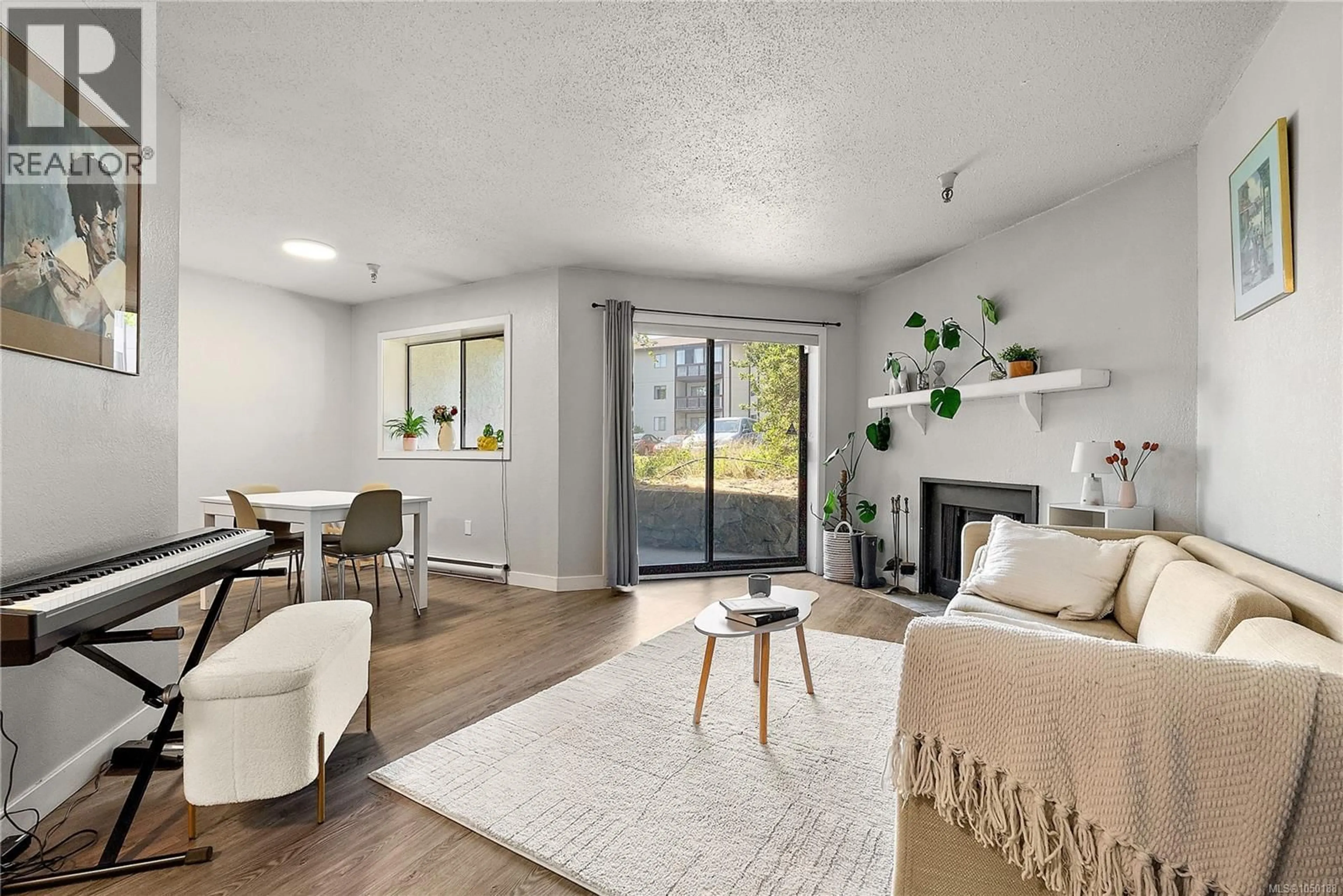Living room with furniture, unknown for 106 - 71 GORGE ROAD WEST, Saanich British Columbia V9A1L9