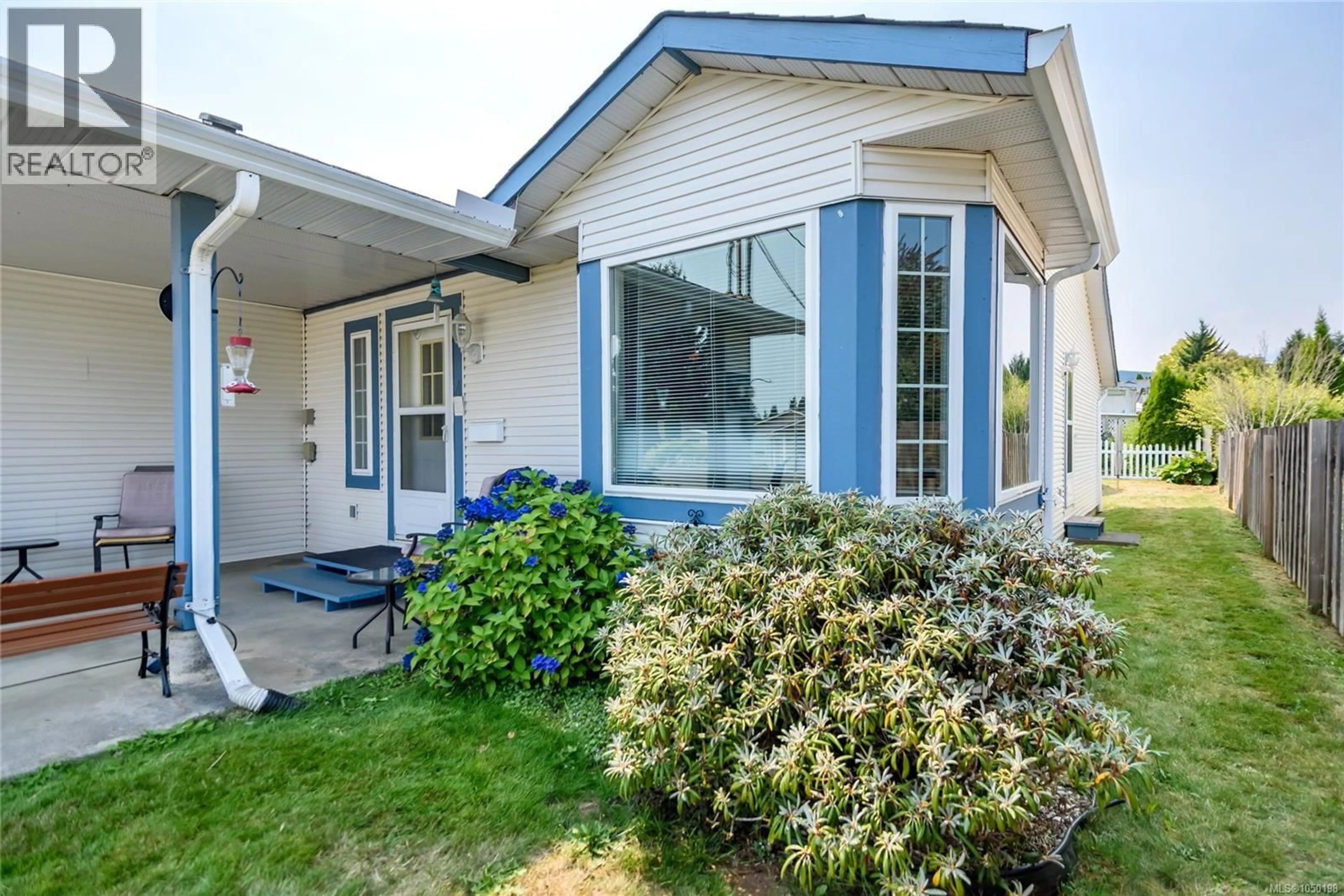 Home with vinyl exterior material, street for A - 3319 SEVENTH STREET, Cumberland British Columbia V0R1S0