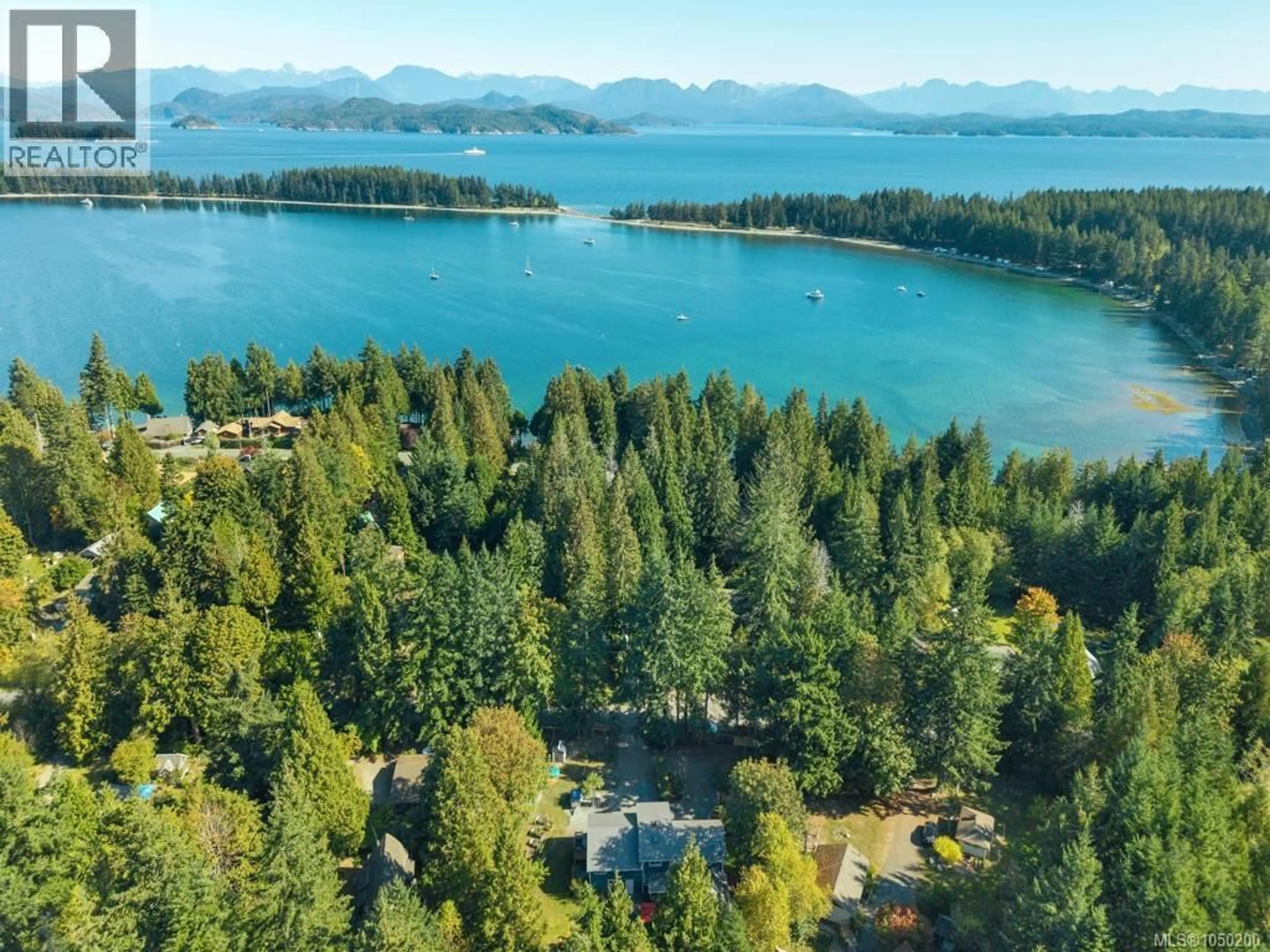 A pic from outside/outdoor area/front of a property/back of a property/a pic from drone, water/lake/river/ocean view for 1371 HOOLEY ROAD, Quadra Island British Columbia V0P1H0