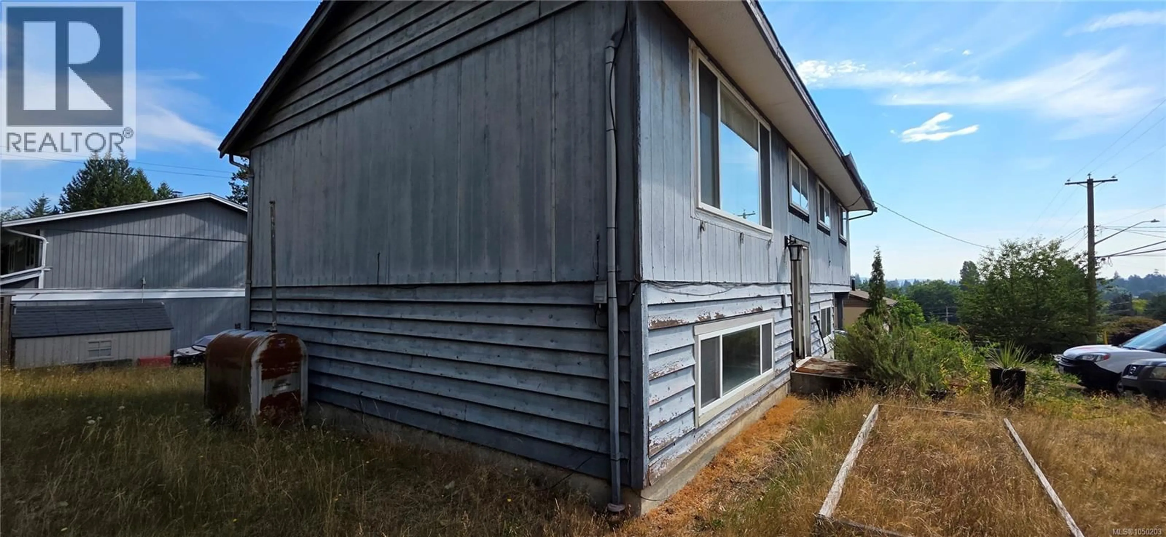 Home with vinyl exterior material, building for 614 SEVENTH STREET, Nanaimo British Columbia V9R1G2