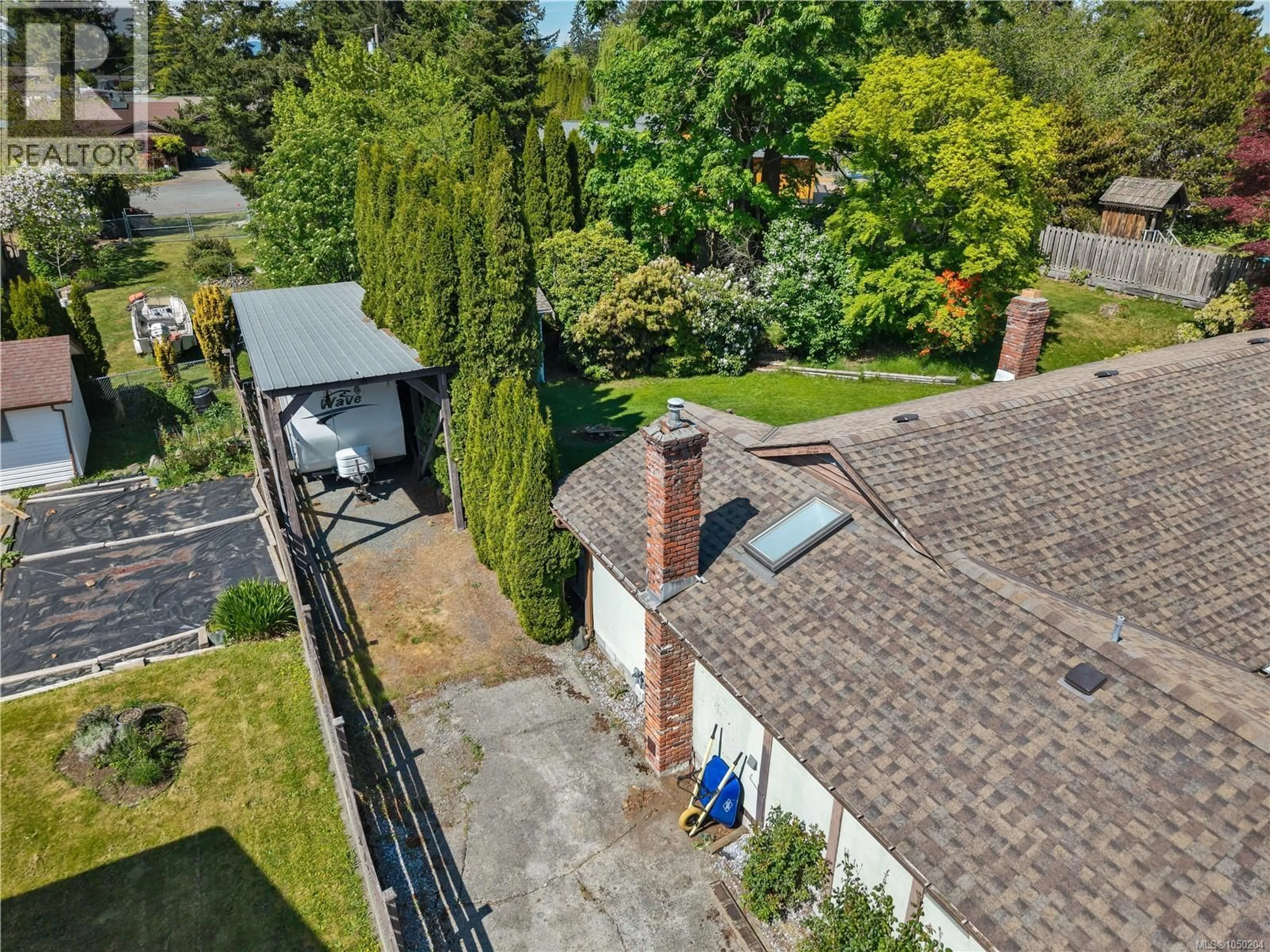 A pic from outside/outdoor area/front of a property/back of a property/a pic from drone, street for 1930 GILLIAN PLACE, Campbell River British Columbia V9W6B6