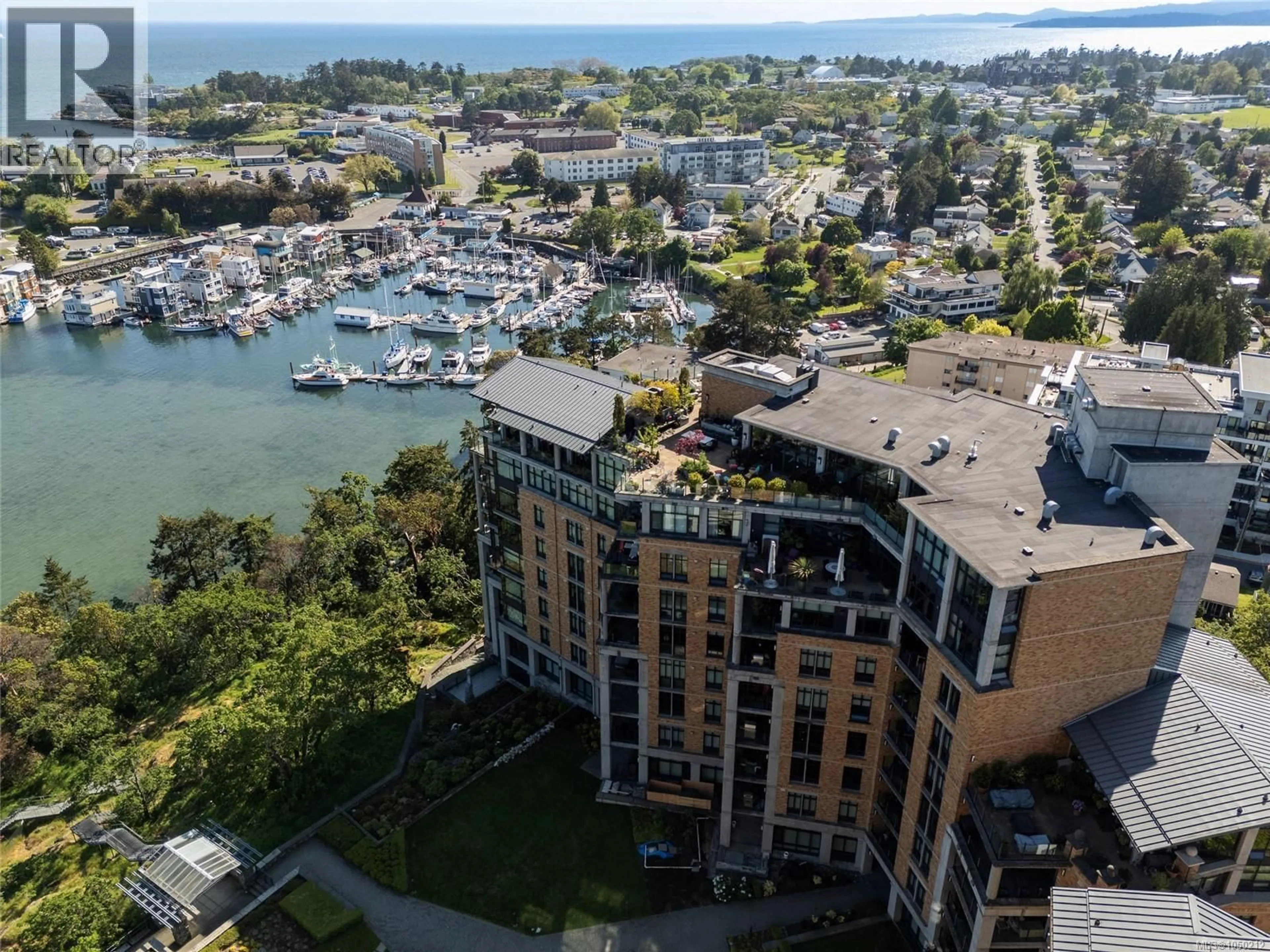 A pic from outside/outdoor area/front of a property/back of a property/a pic from drone, water/lake/river/ocean view for 106 - 847 DUNSMUIR ROAD, Esquimalt British Columbia V9A0A5