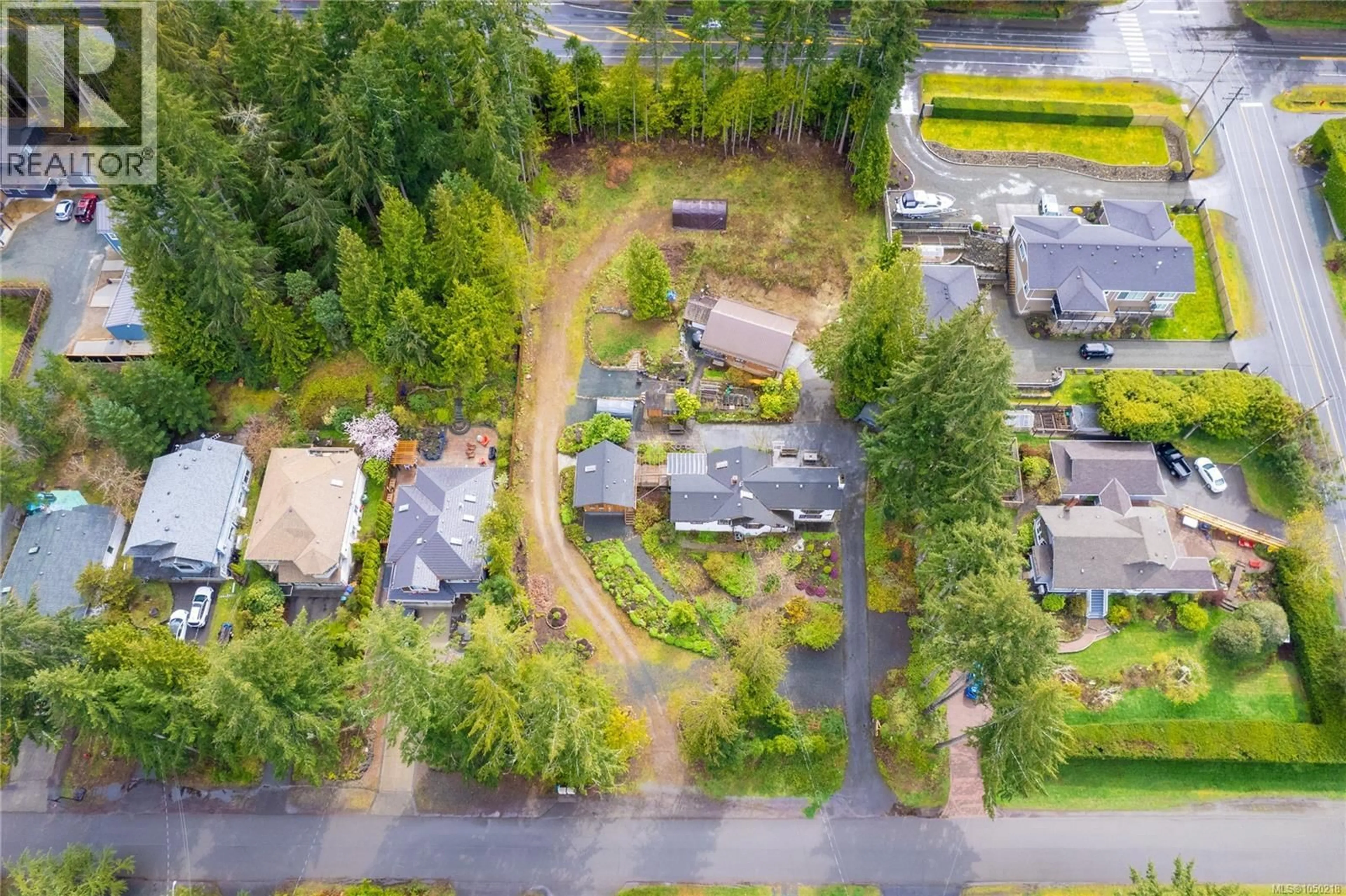 A pic from outside/outdoor area/front of a property/back of a property/a pic from drone, unknown for 218 SUNNINGDALE ROAD EAST, Qualicum Beach British Columbia V9K1L3