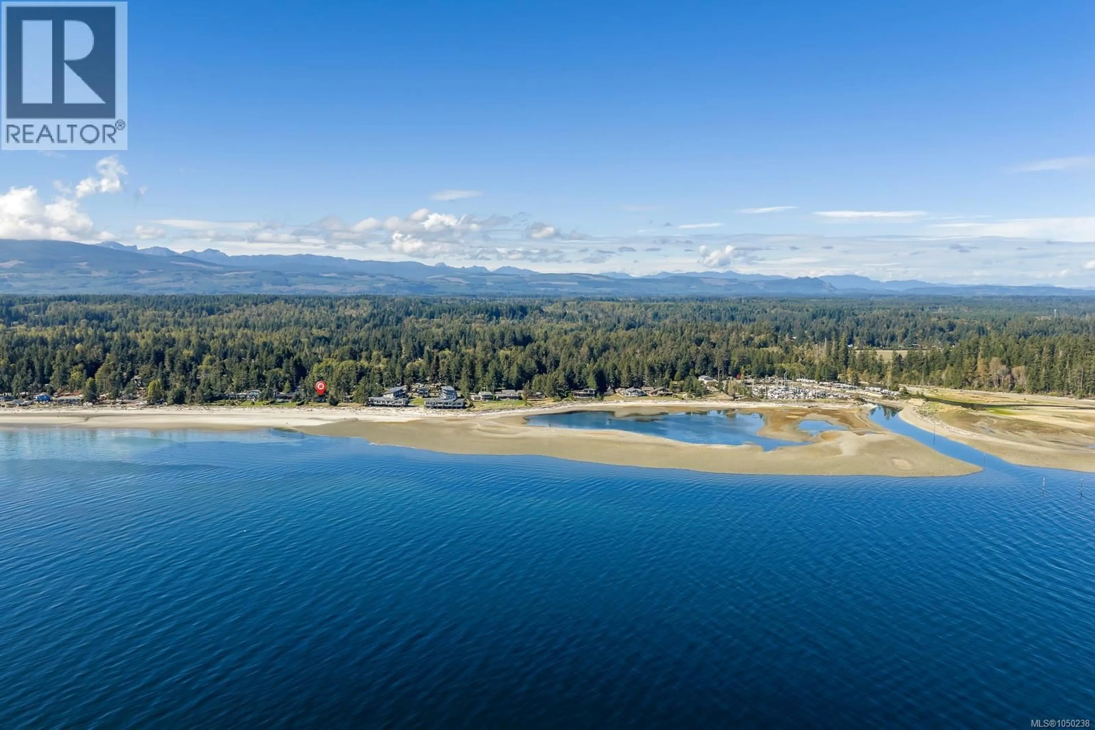 A pic from outside/outdoor area/front of a property/back of a property/a pic from drone, water/lake/river/ocean view for 8998 CLARKSON AVENUE, Black Creek British Columbia V9J1B2