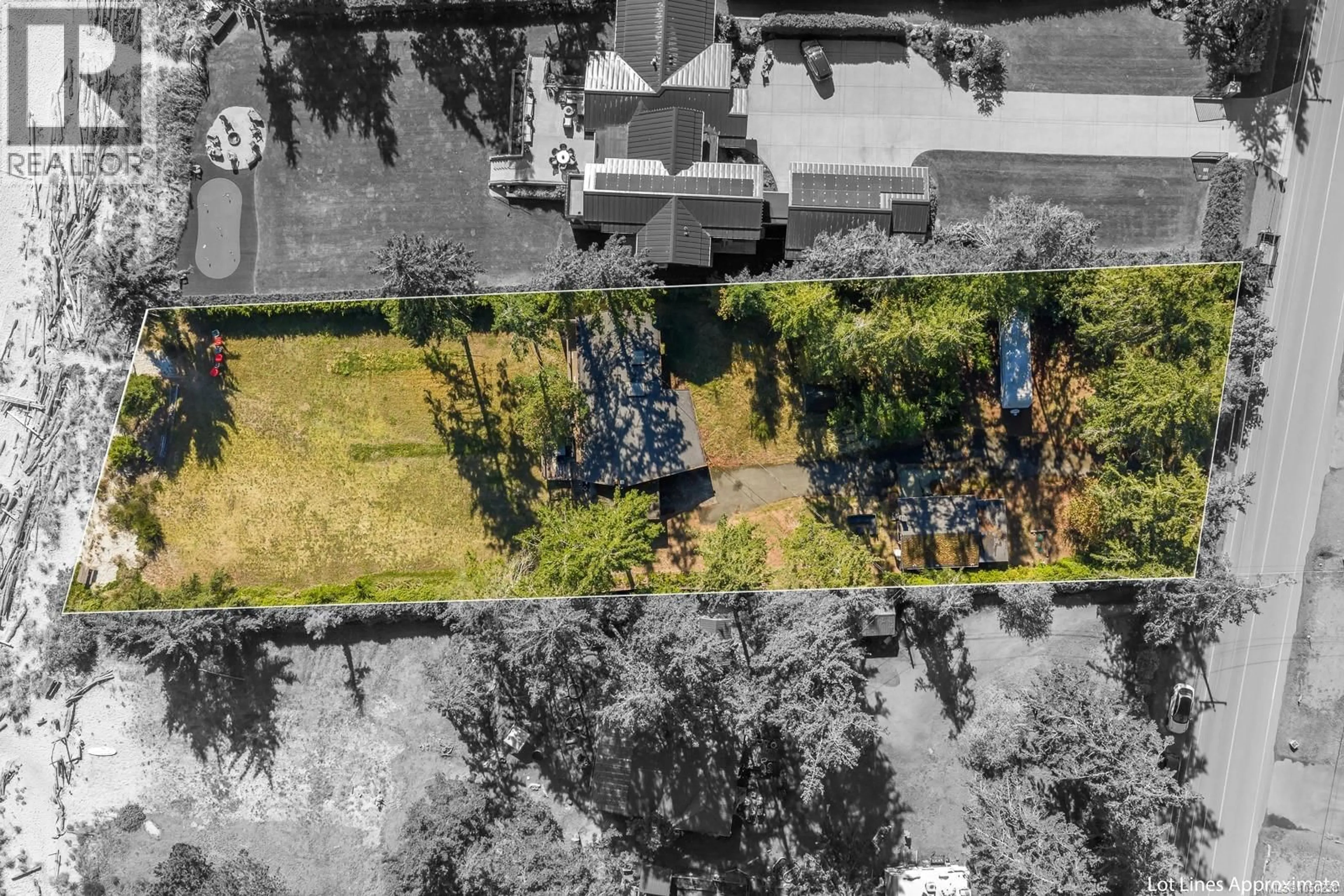 A pic from outside/outdoor area/front of a property/back of a property/a pic from drone, street for 8998 CLARKSON AVENUE, Black Creek British Columbia V9J1B2