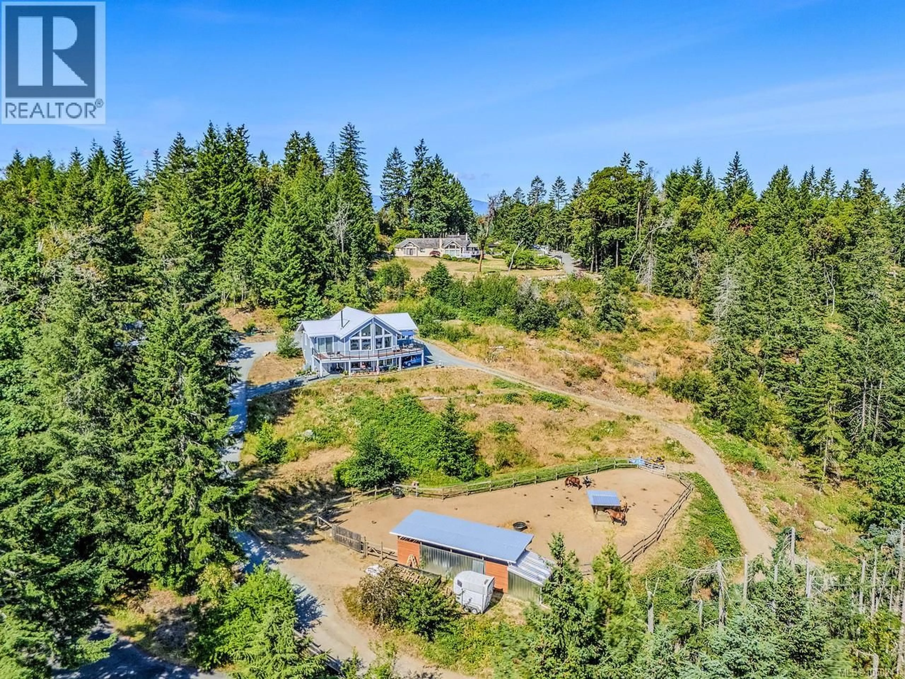 A pic from outside/outdoor area/front of a property/back of a property/a pic from drone, unknown for 1860 MORELLO ROAD, Nanoose Bay British Columbia V9P9B1