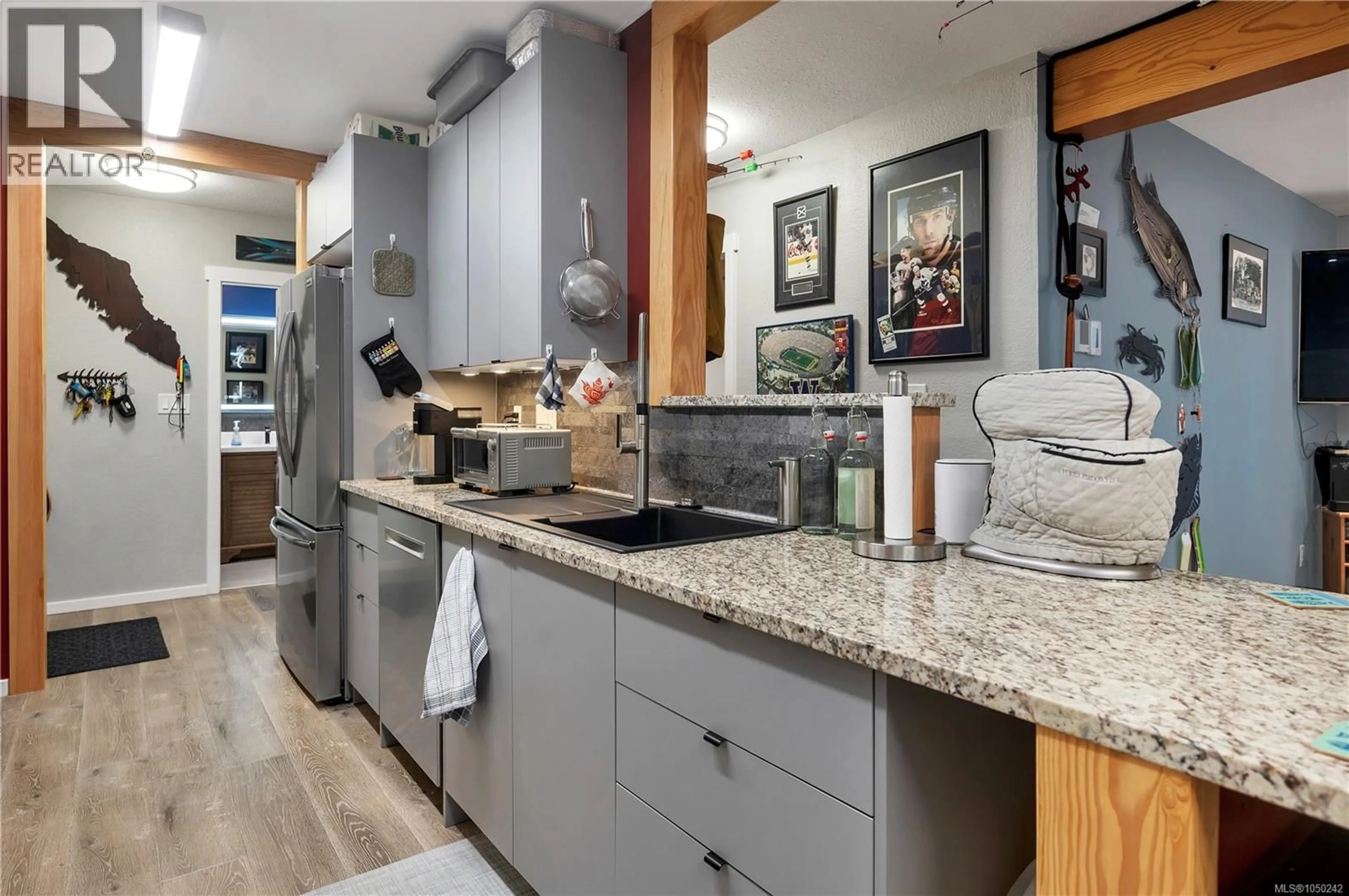 Contemporary kitchen, ceramic/tile floor for 310 - 611 MACMILLAN DRIVE, Sayward British Columbia V0P1R0