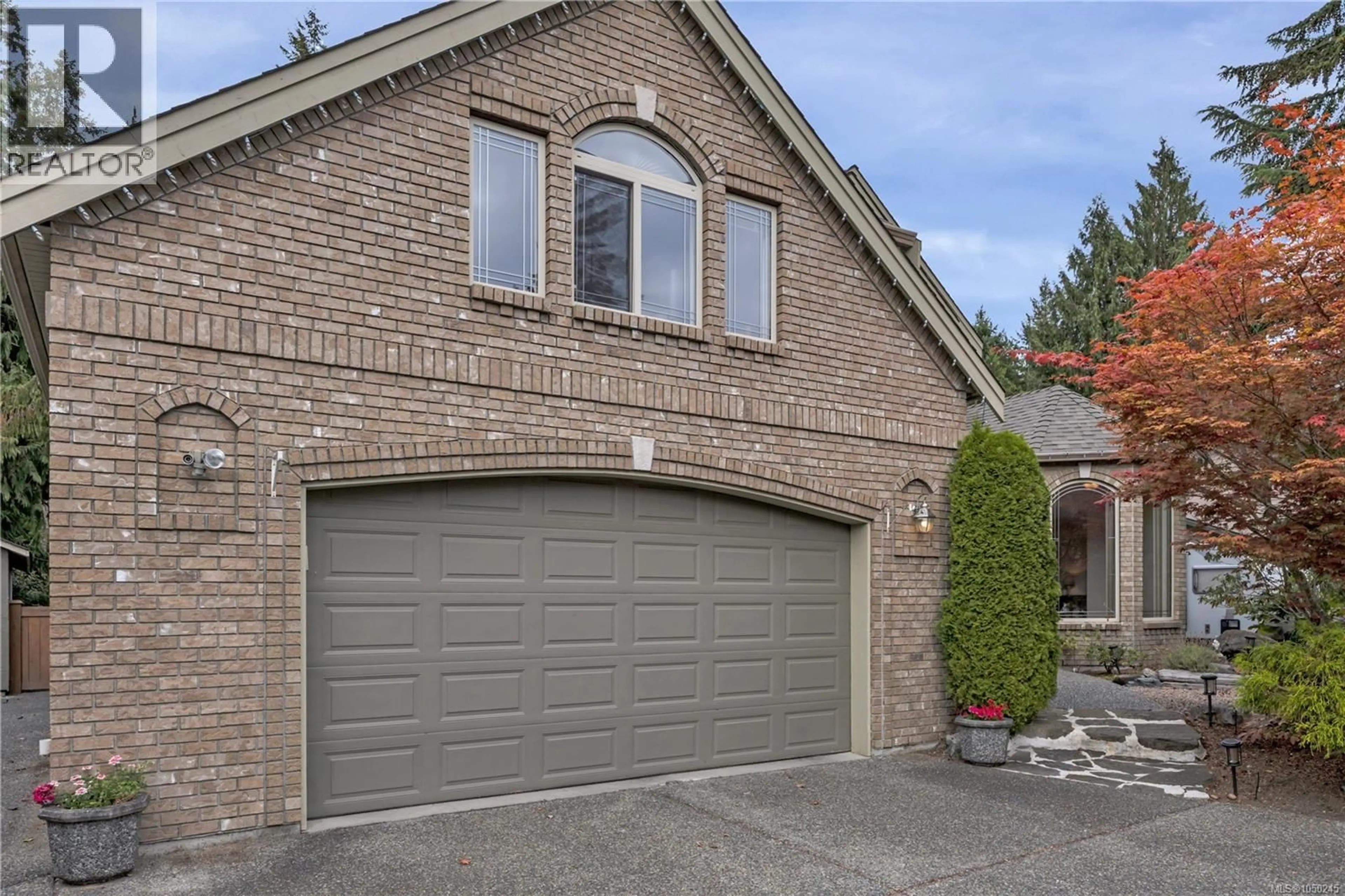 Home with brick exterior material, street for 901 SAVARY DRIVE, Qualicum Beach British Columbia V9K1R7