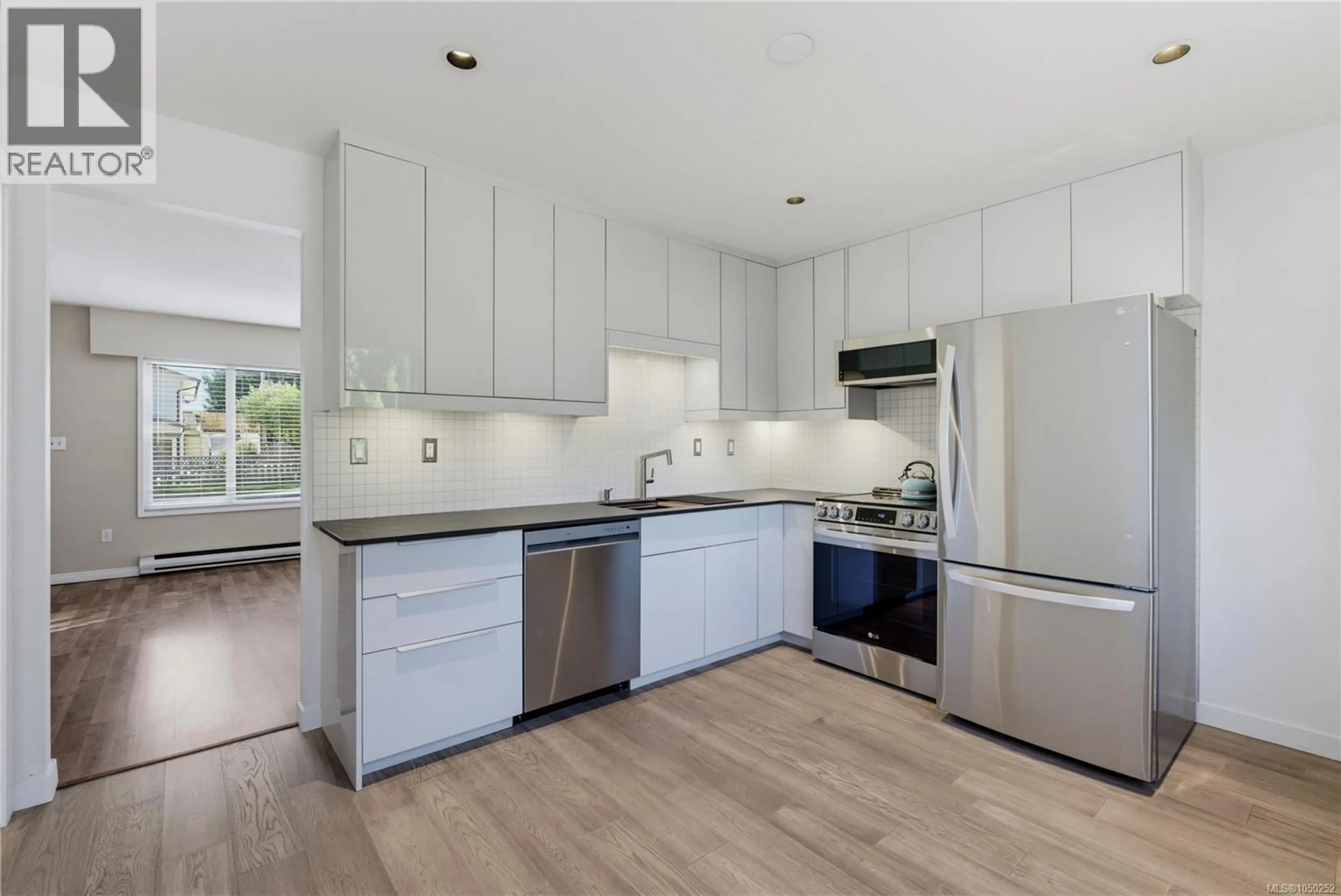 Open concept kitchen, unknown for 1714 ASHDALE PLACE, Saanich British Columbia V8N1N9