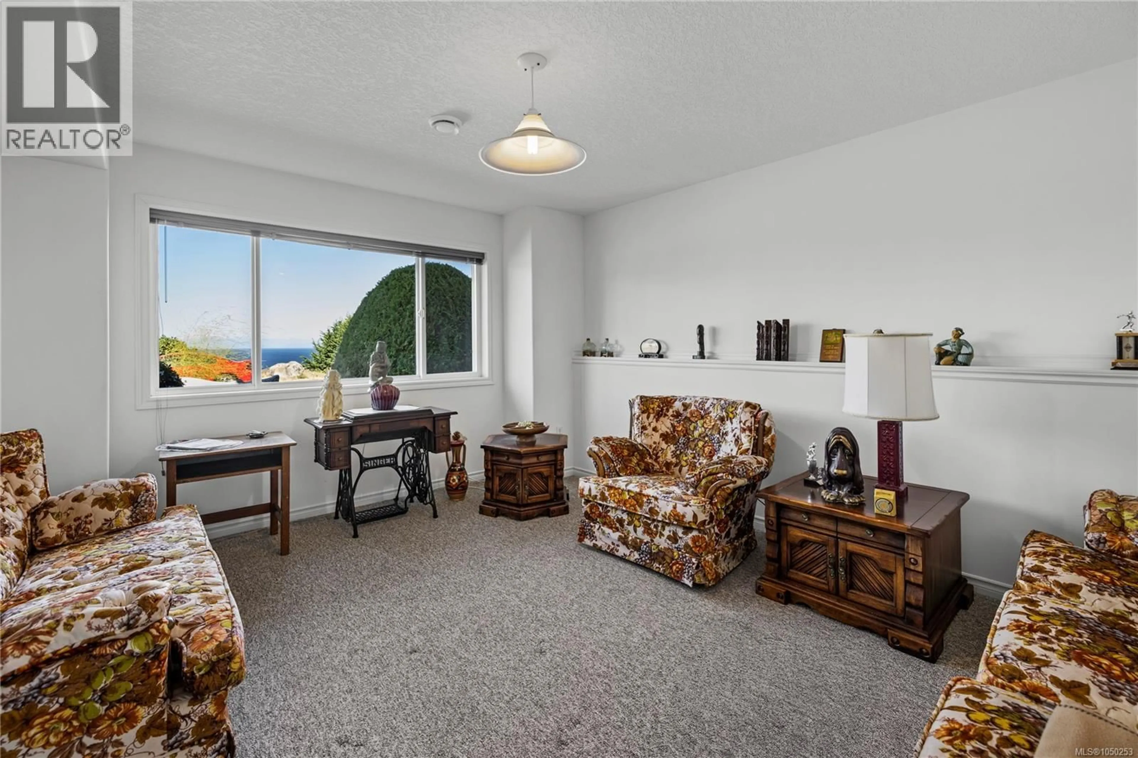 Living room with furniture, carpet floor for 6577 GOLDEN EAGLE WAY, Nanaimo British Columbia V9V1P8