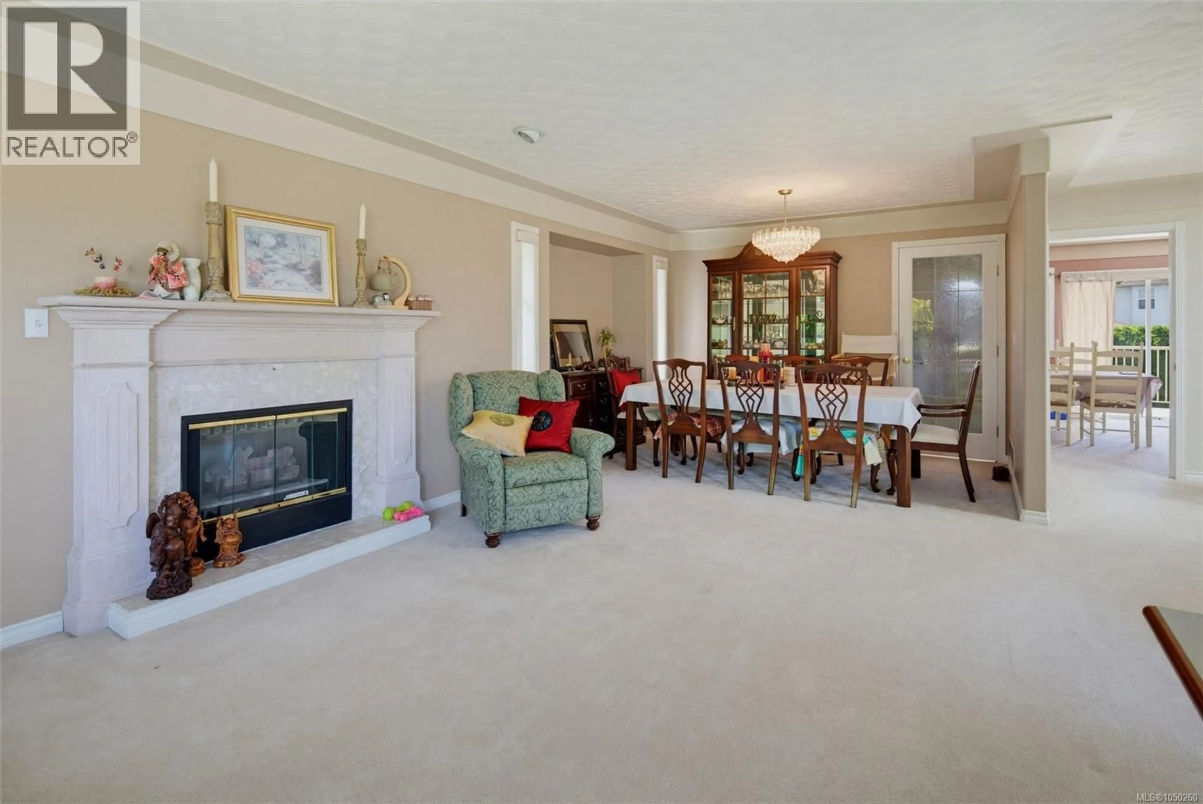 Living room with furniture, unknown for 1847 EL SERENO DRIVE, Saanich British Columbia V8N6K4