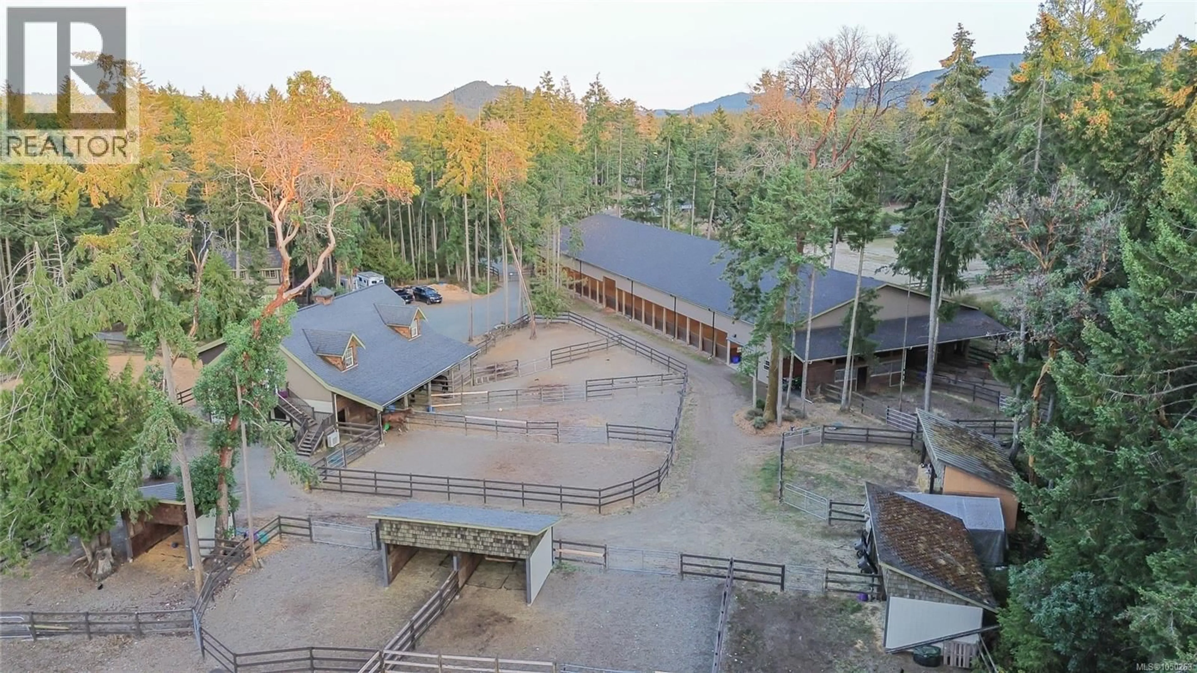 A pic from outside/outdoor area/front of a property/back of a property/a pic from drone, mountain view for 2065 SANDERS ROAD, Nanoose Bay British Columbia V9P9C2