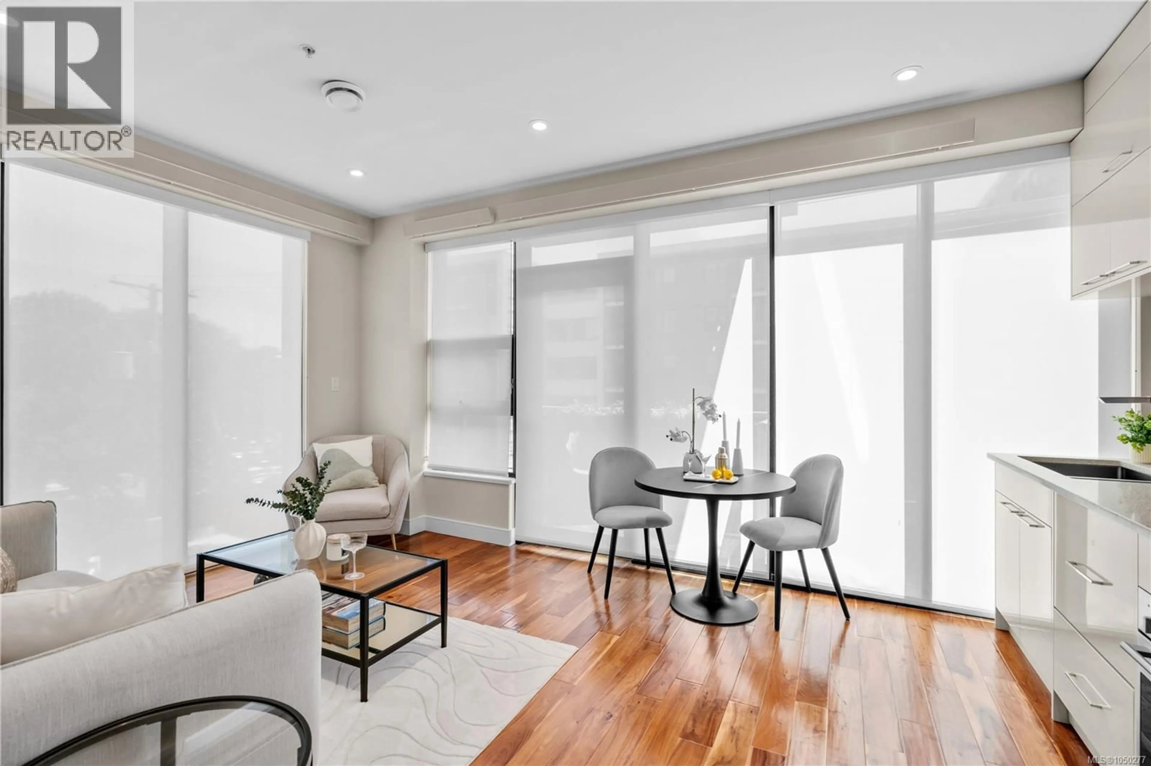 Living room with furniture, wood/laminate floor for S310 - 1411 COOK STREET, Victoria British Columbia V8V0E8
