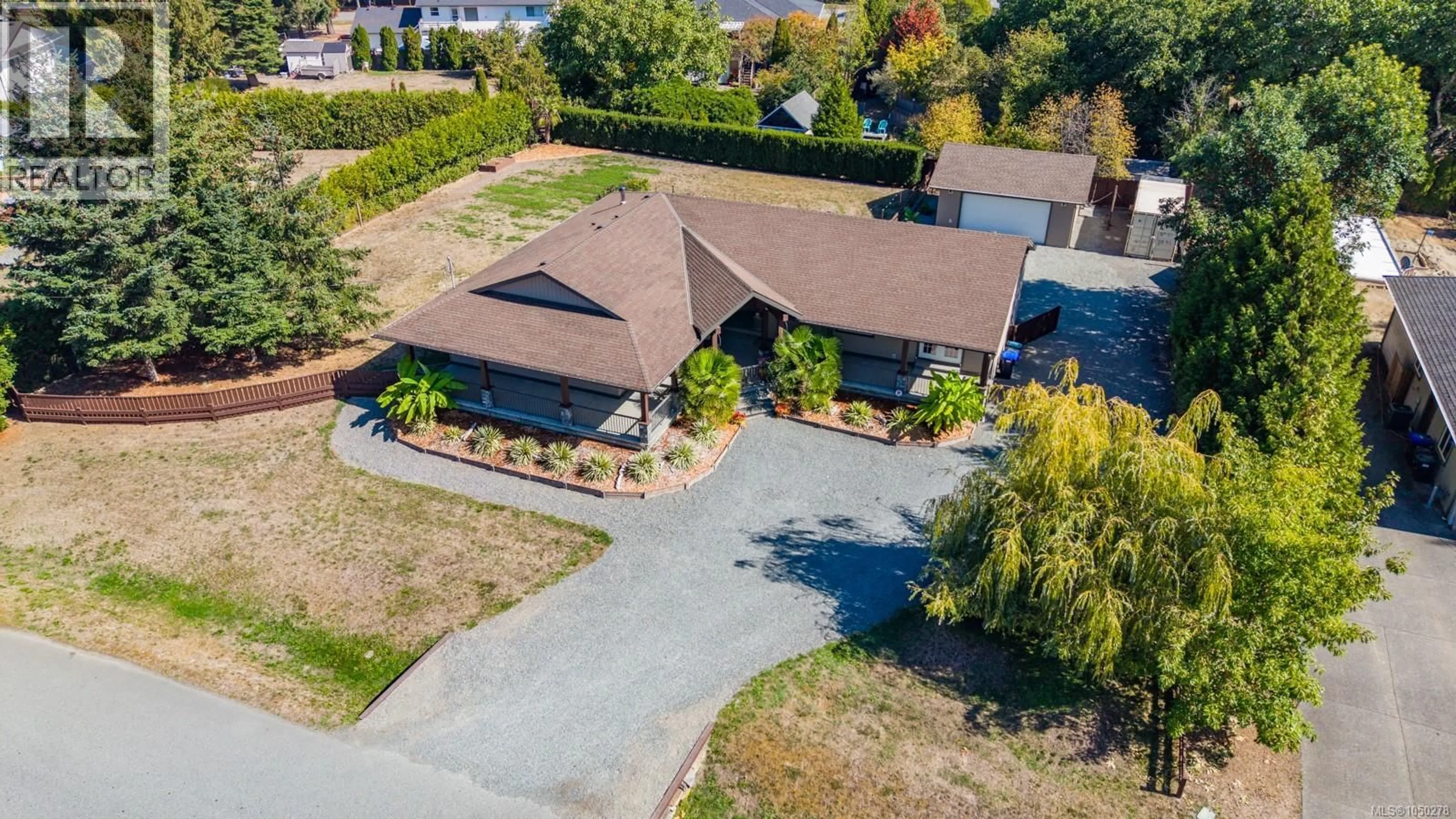 A pic from outside/outdoor area/front of a property/back of a property/a pic from drone, street for 2070 SARAS WAY, Nanaimo British Columbia V9X1K6