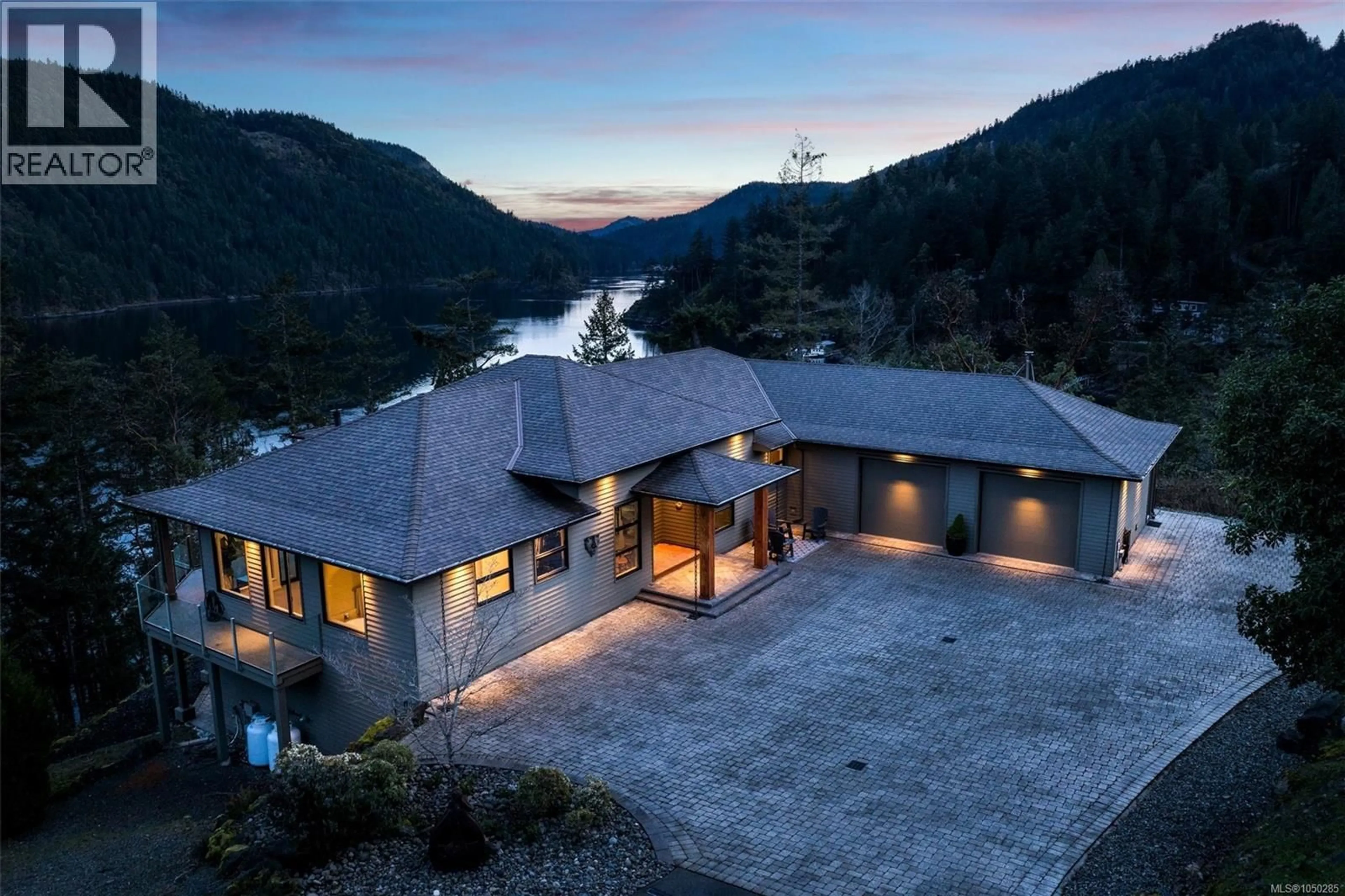 A pic from outside/outdoor area/front of a property/back of a property/a pic from drone, water/lake/river/ocean view for 1081 ASPEN ROAD, Malahat British Columbia V0R2L0