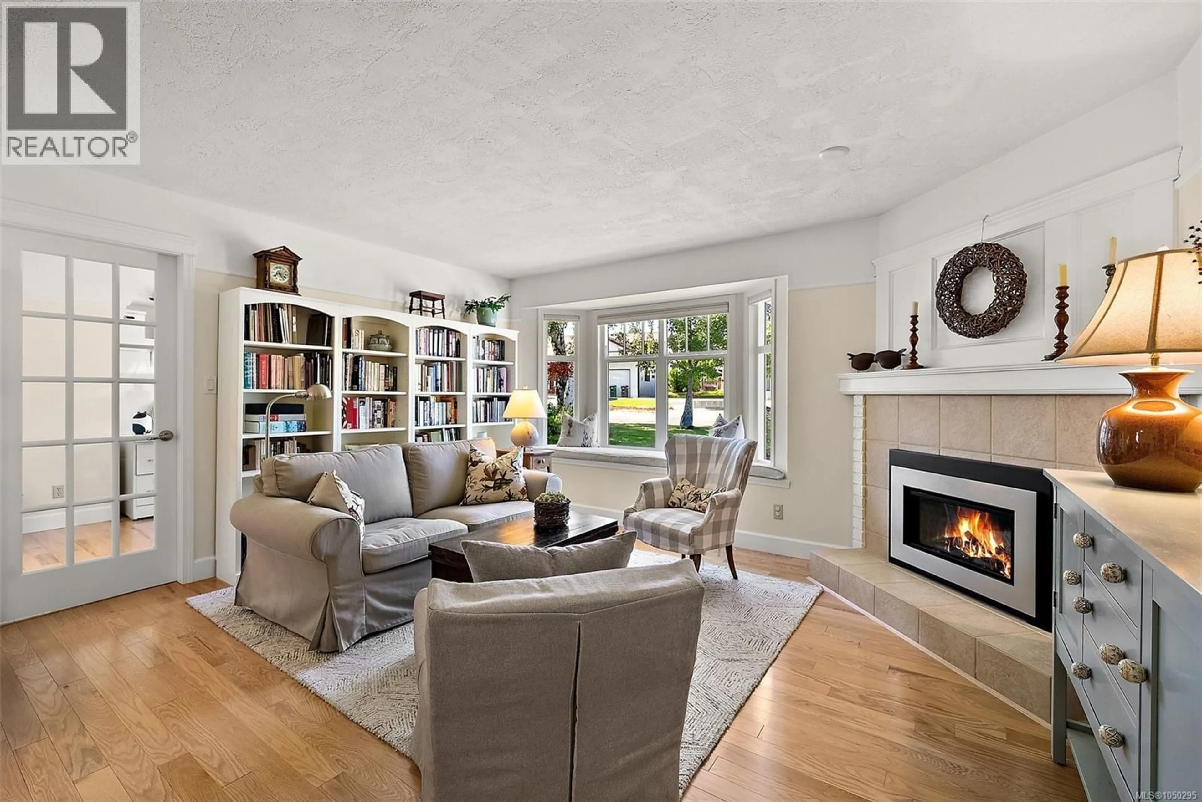 Living room with furniture, unknown for 3995 BEL NOR PLACE, Saanich British Columbia V8N6B6