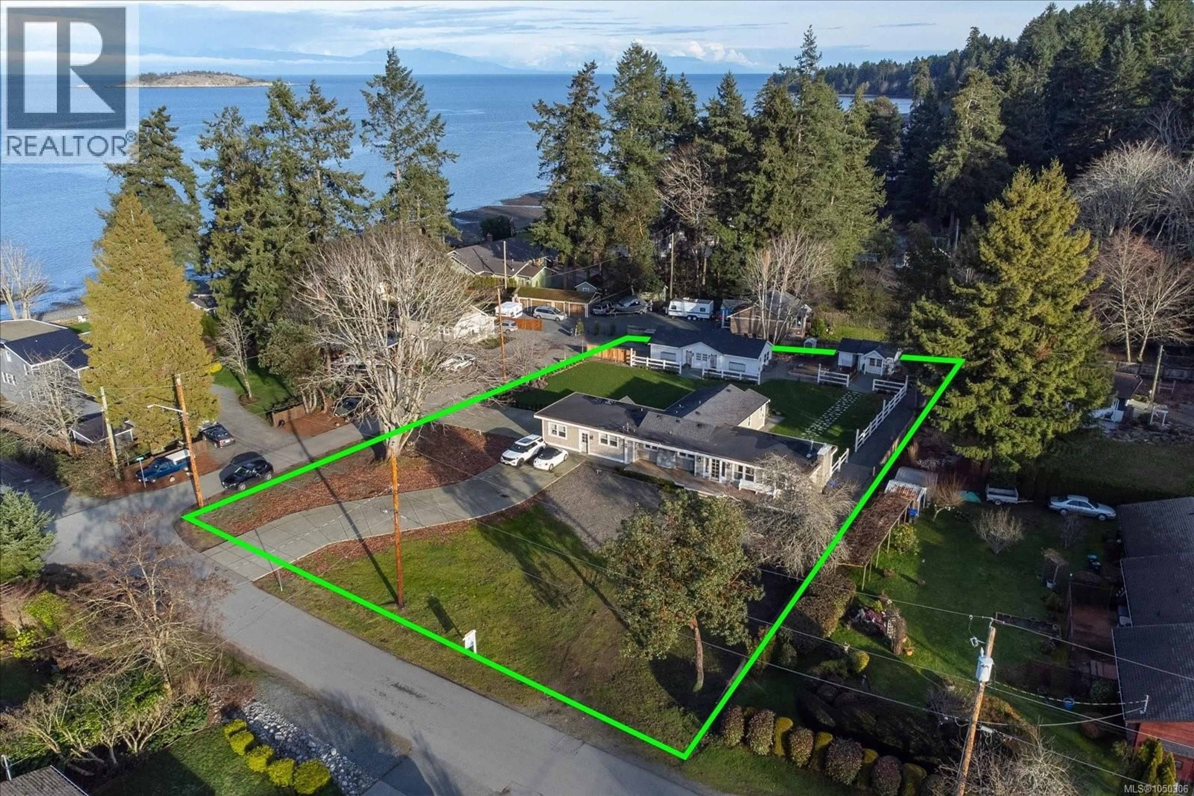 A pic from outside/outdoor area/front of a property/back of a property/a pic from drone, water/lake/river/ocean view for 7128 BENWALDUN ROAD, Lantzville British Columbia V0R2H0