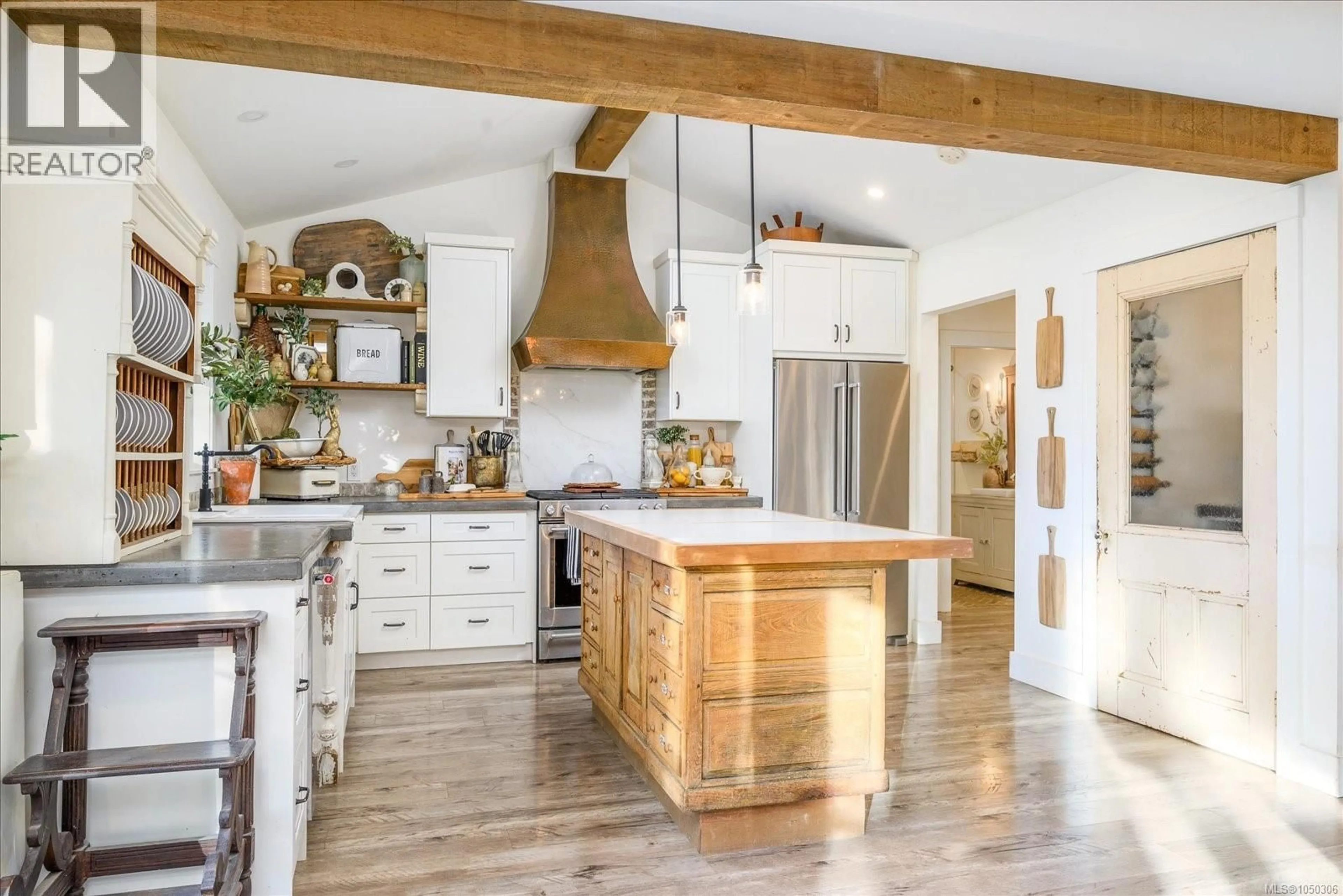 Rustic kitchen, wood/laminate floor for 7128 BENWALDUN ROAD, Lantzville British Columbia V0R2H0
