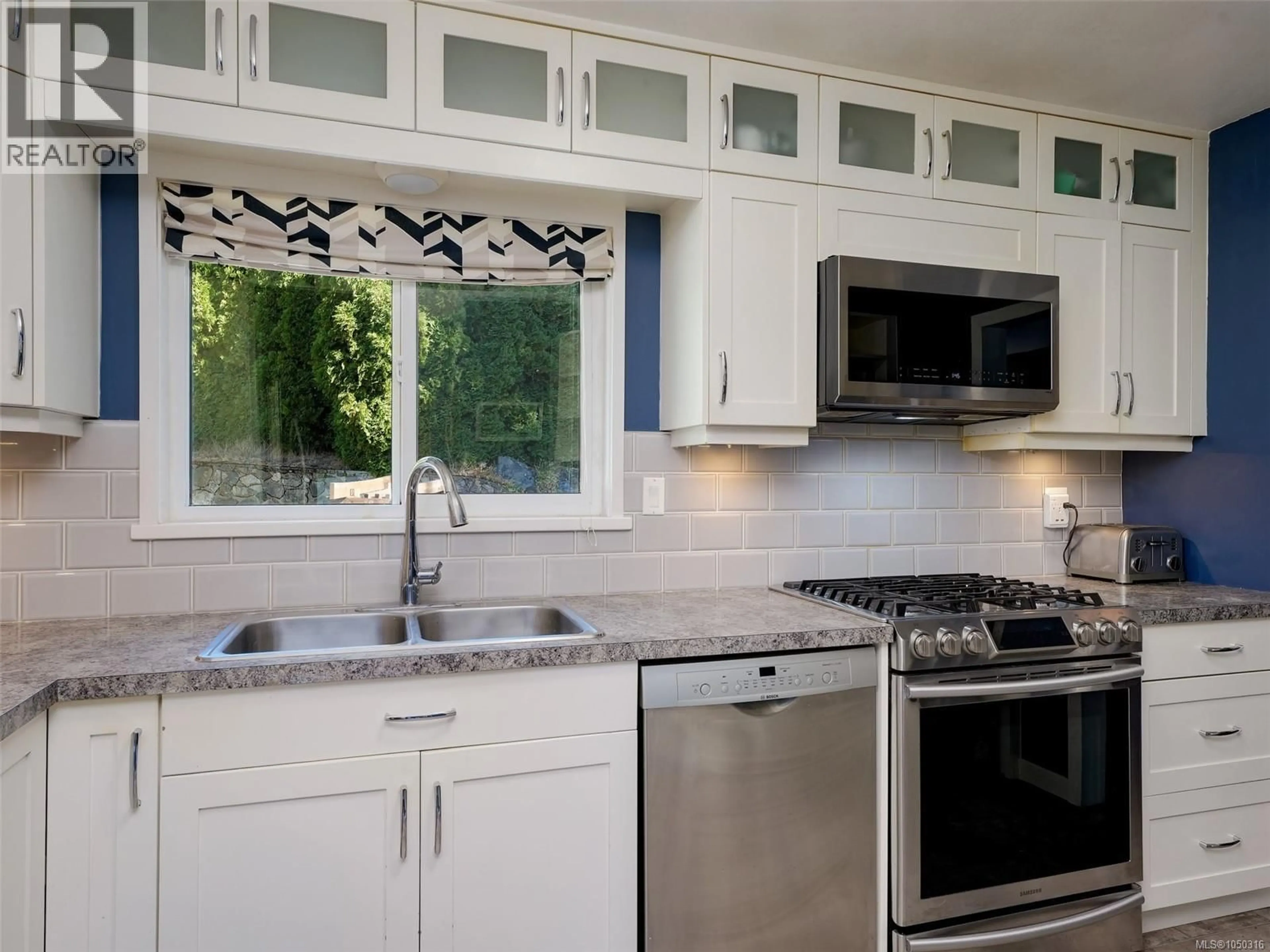 Contemporary kitchen, ceramic/tile floor for 6647 TRUDEAU TERRACE, Central Saanich British Columbia V8M1A3