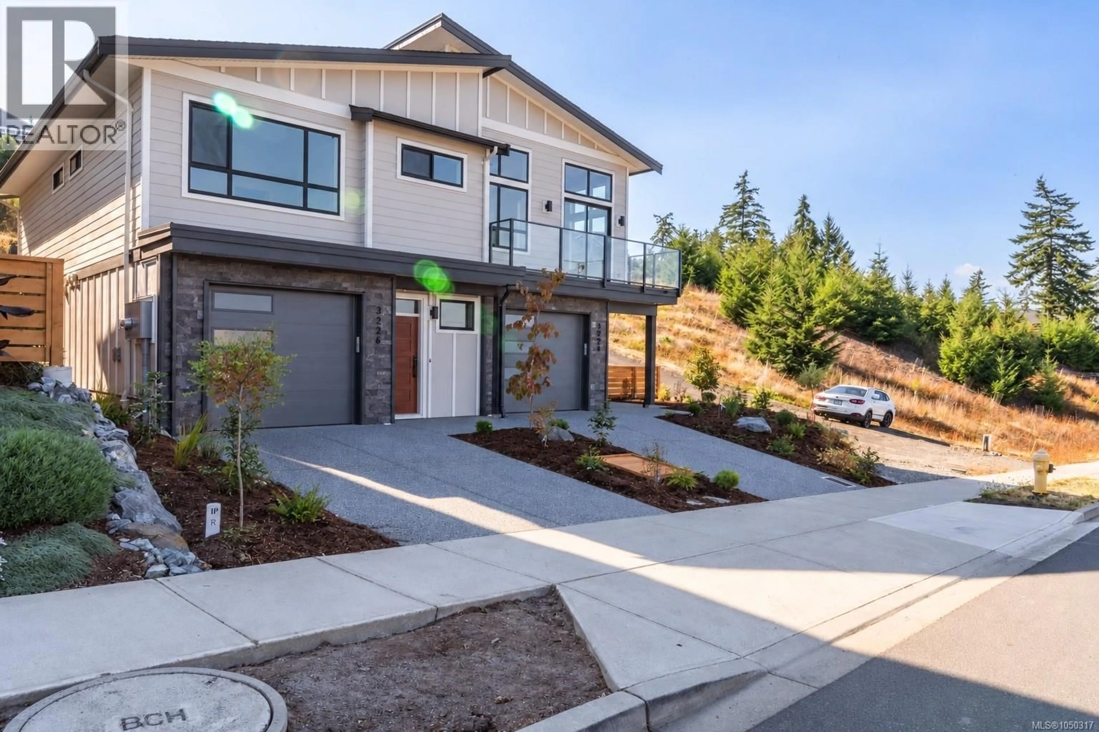 Home with brick exterior material, street for 3226 WOODRUSH DRIVE, Duncan British Columbia V9L0J9