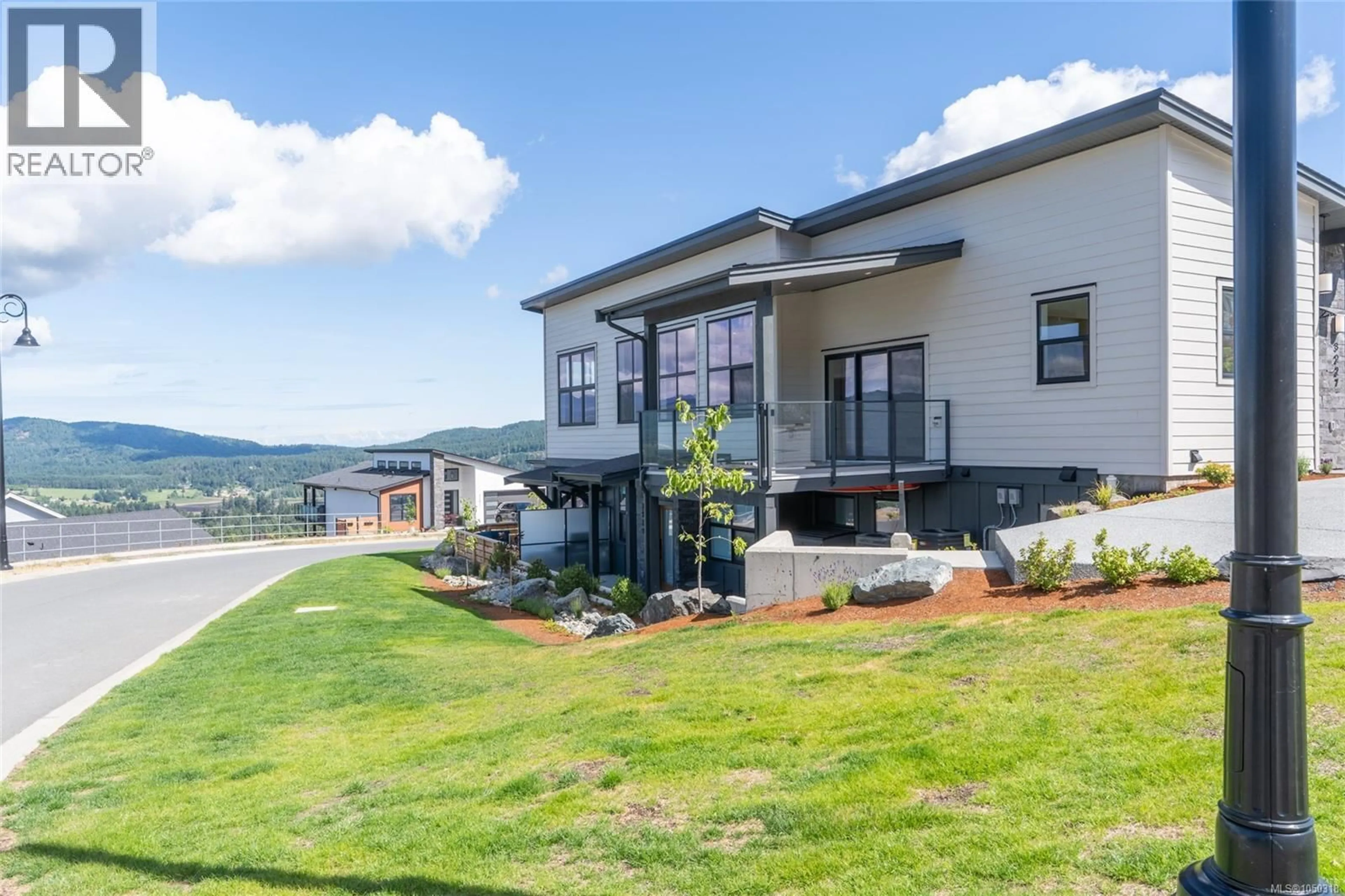 A pic from outside/outdoor area/front of a property/back of a property/a pic from drone, mountain view for 3227 WOODRUSH DRIVE, Duncan British Columbia V9L0J9