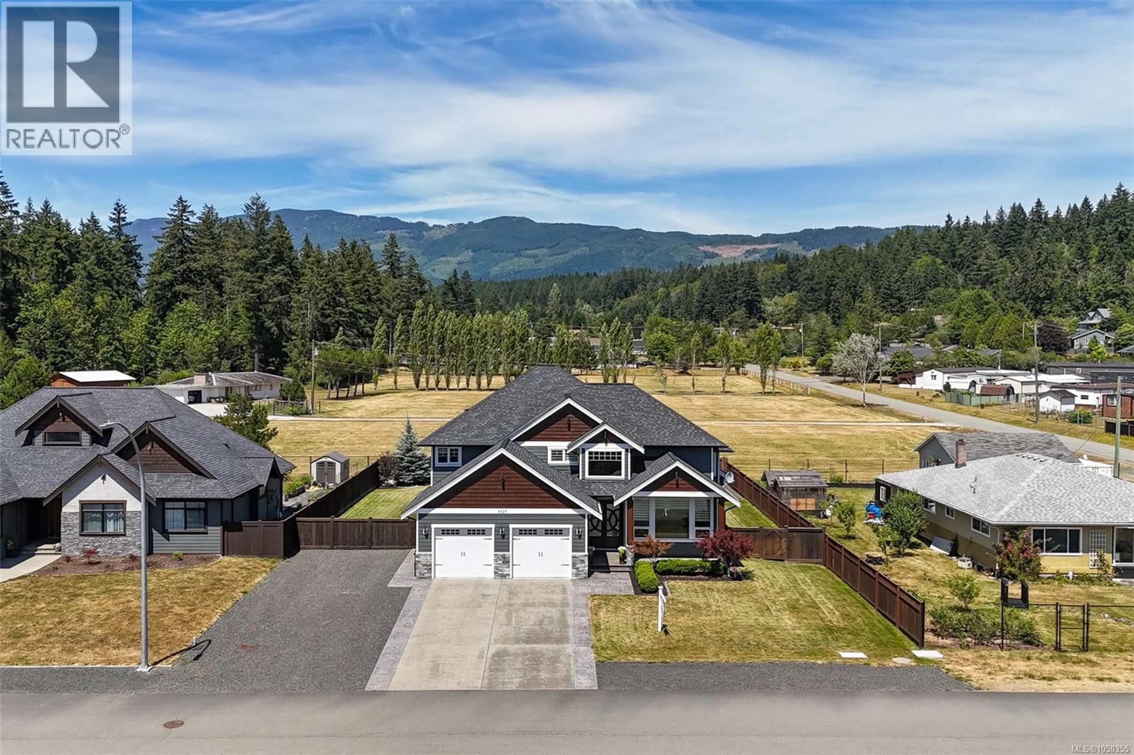 A pic from outside/outdoor area/front of a property/back of a property/a pic from drone, mountain view for 5327 OTTER PLACE, Port Alberni British Columbia V9Y8X7
