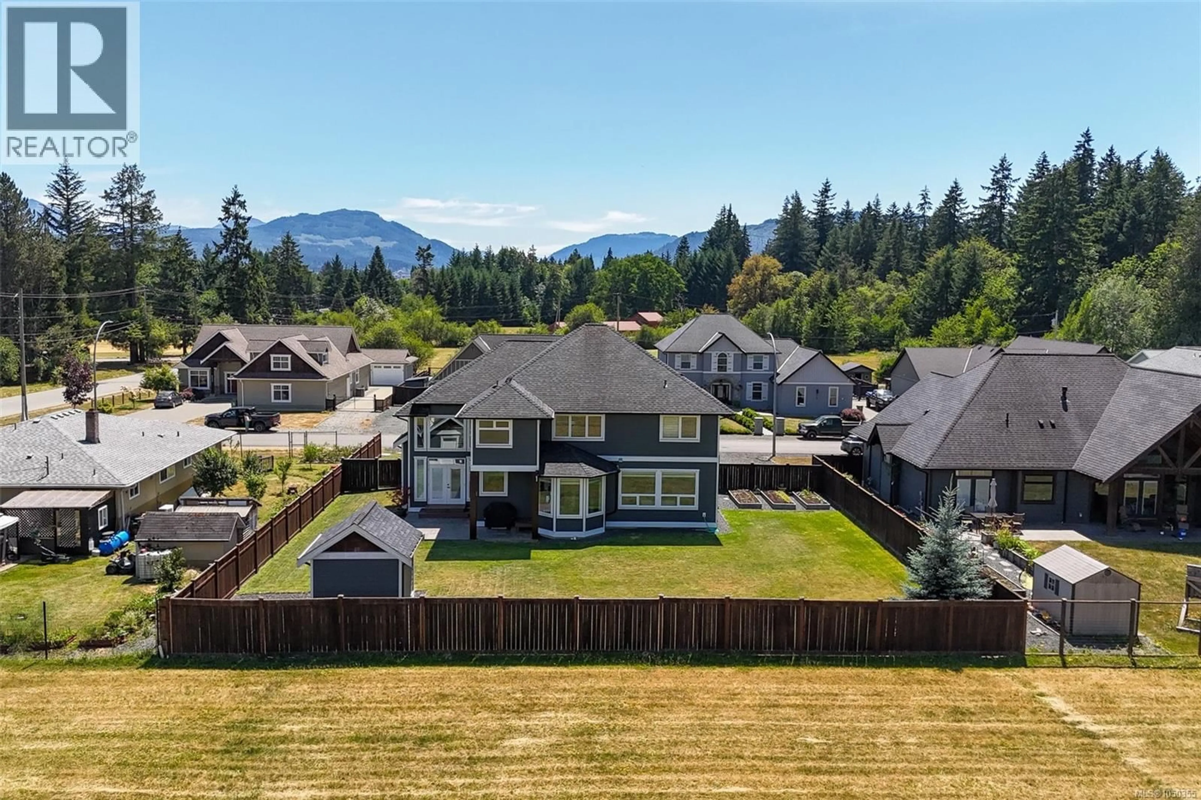 A pic from outside/outdoor area/front of a property/back of a property/a pic from drone, mountain view for 5327 OTTER PLACE, Port Alberni British Columbia V9Y8X7