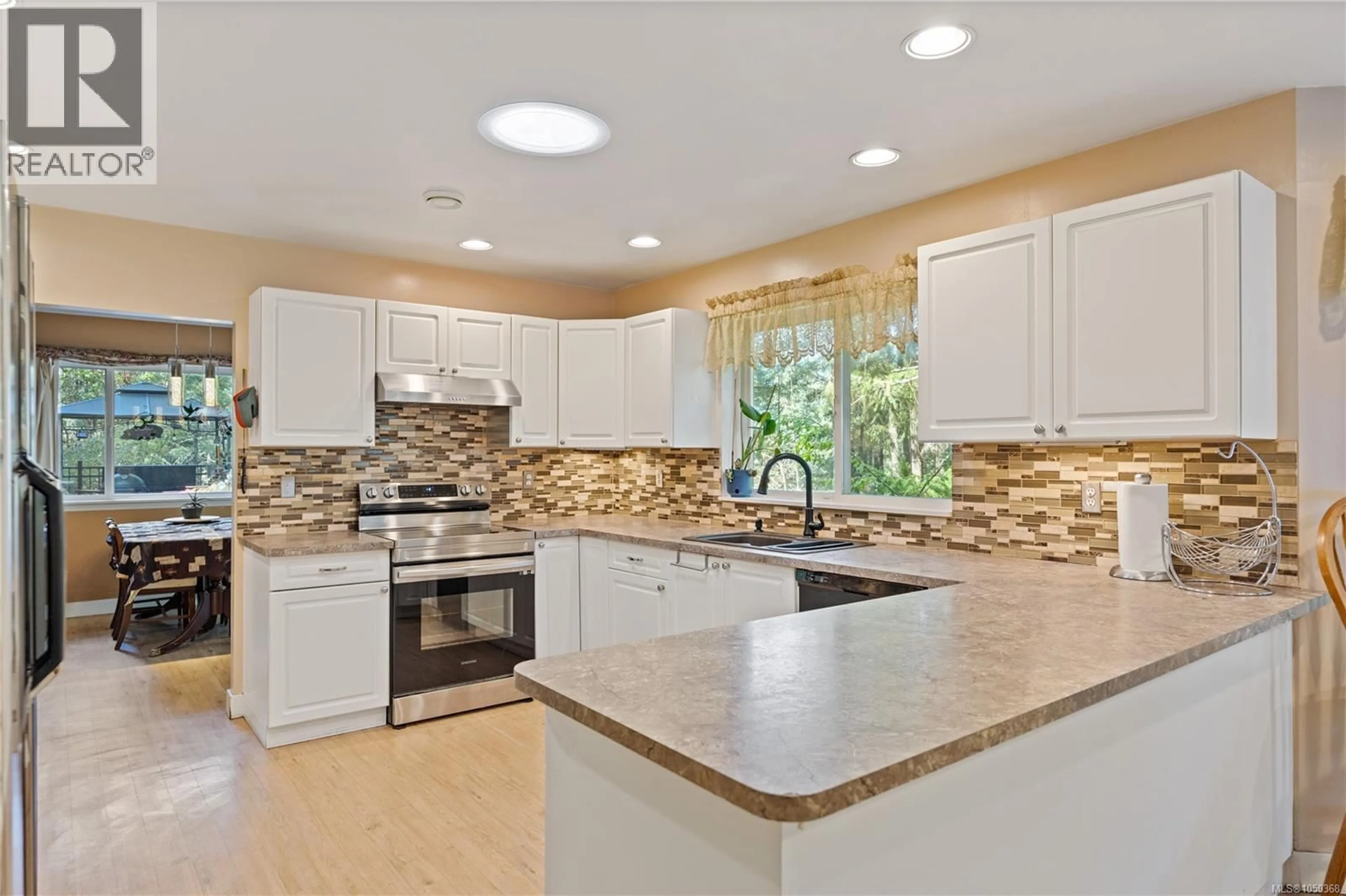 Open concept kitchen, ceramic/tile floor for 661 MILLSTREAM LAKE ROAD, Highlands British Columbia V9B6E9