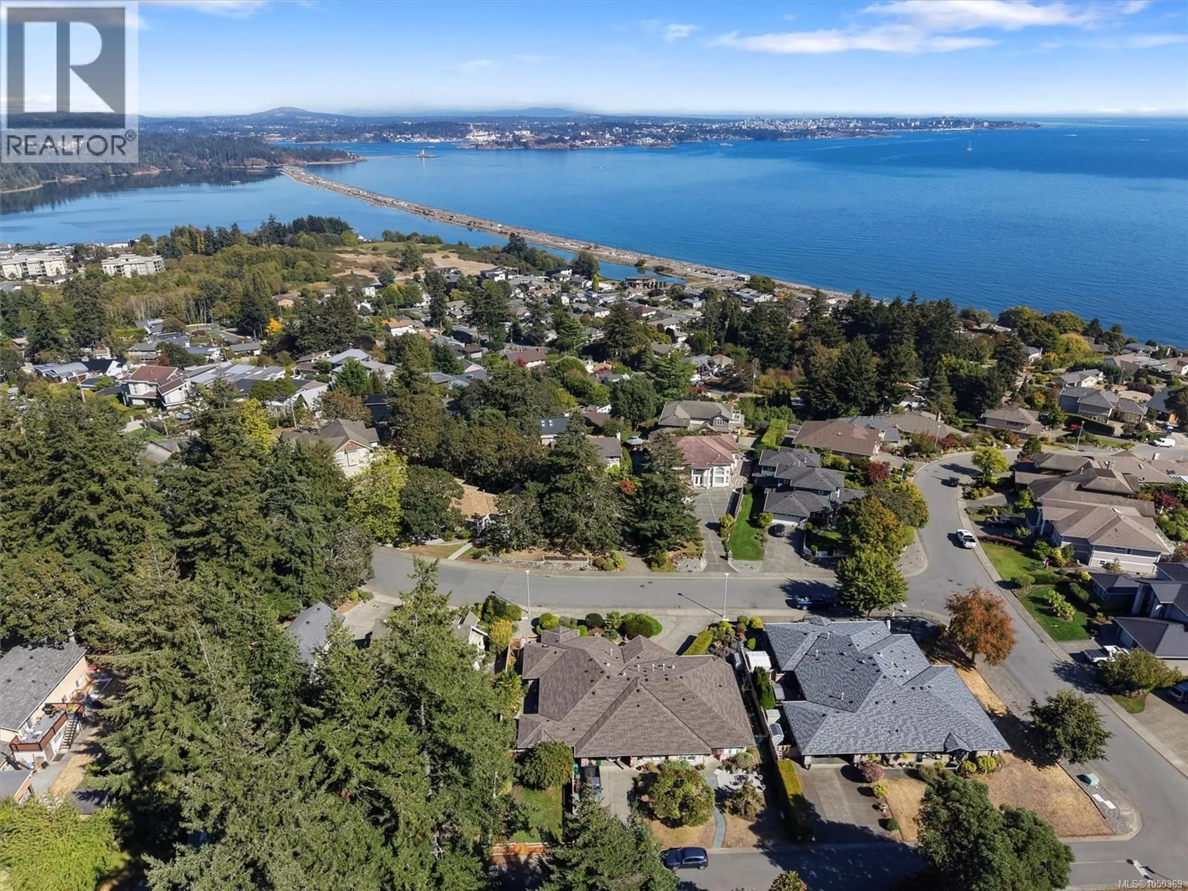 A pic from outside/outdoor area/front of a property/back of a property/a pic from drone, water/lake/river/ocean view for 3370 PASSAGE WAY, Colwood British Columbia V9C1W3