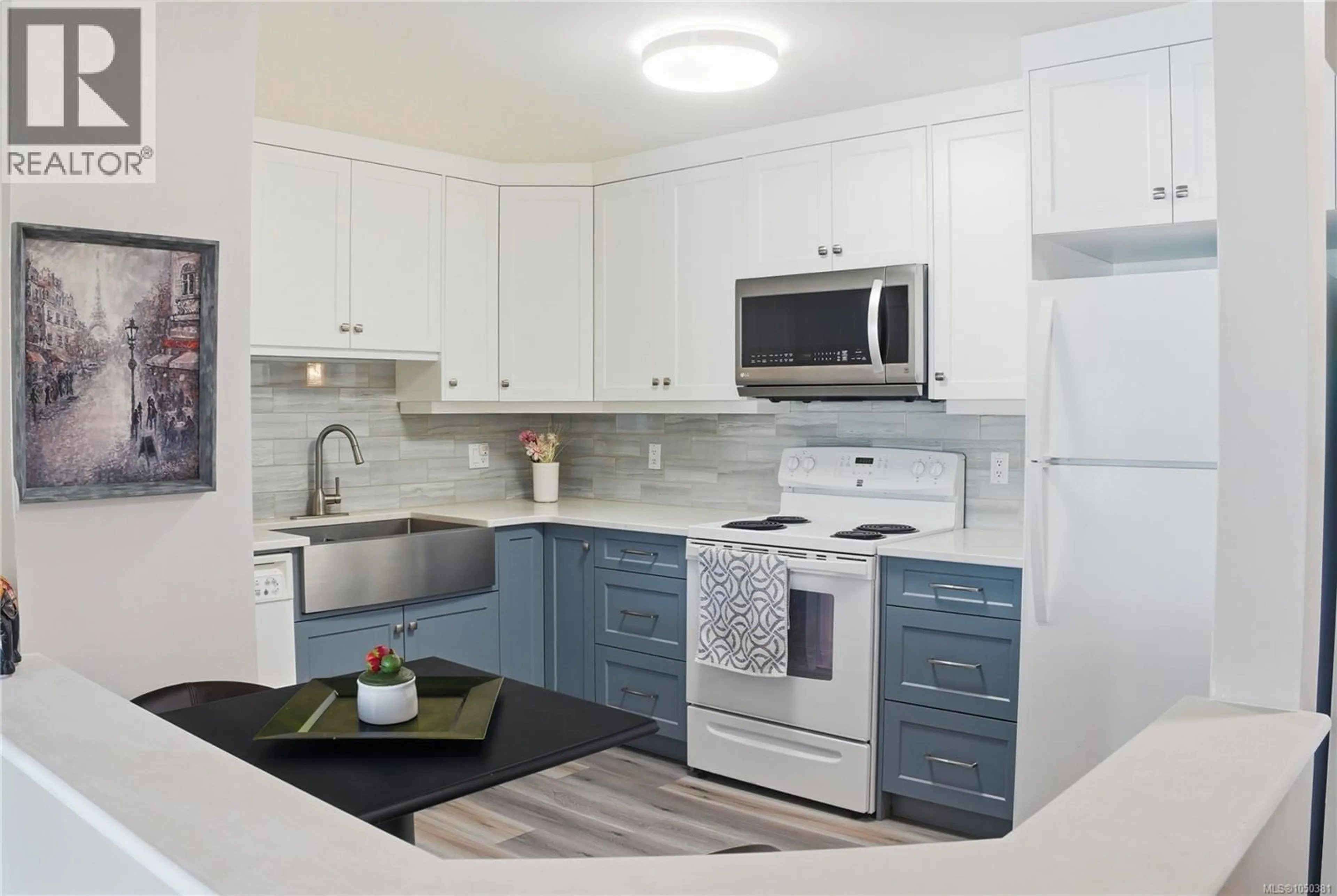 Standard kitchen, ceramic/tile floor for 209 - 5650 EDGEWATER LANE, Nanaimo British Columbia V9T6K1