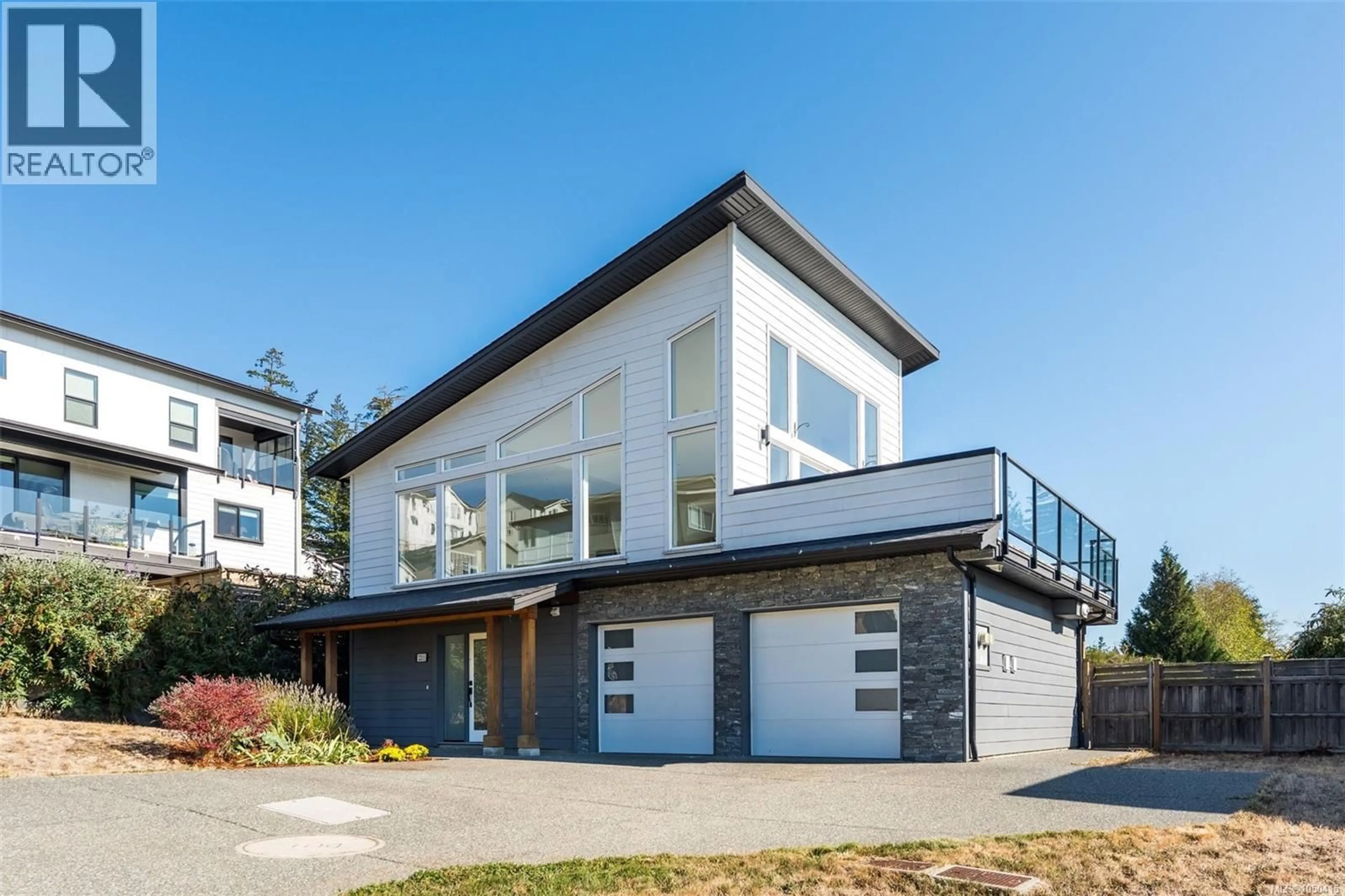Home with vinyl exterior material, street for 2211 WINFIELD DRIVE, Sooke British Columbia V9Z1P1
