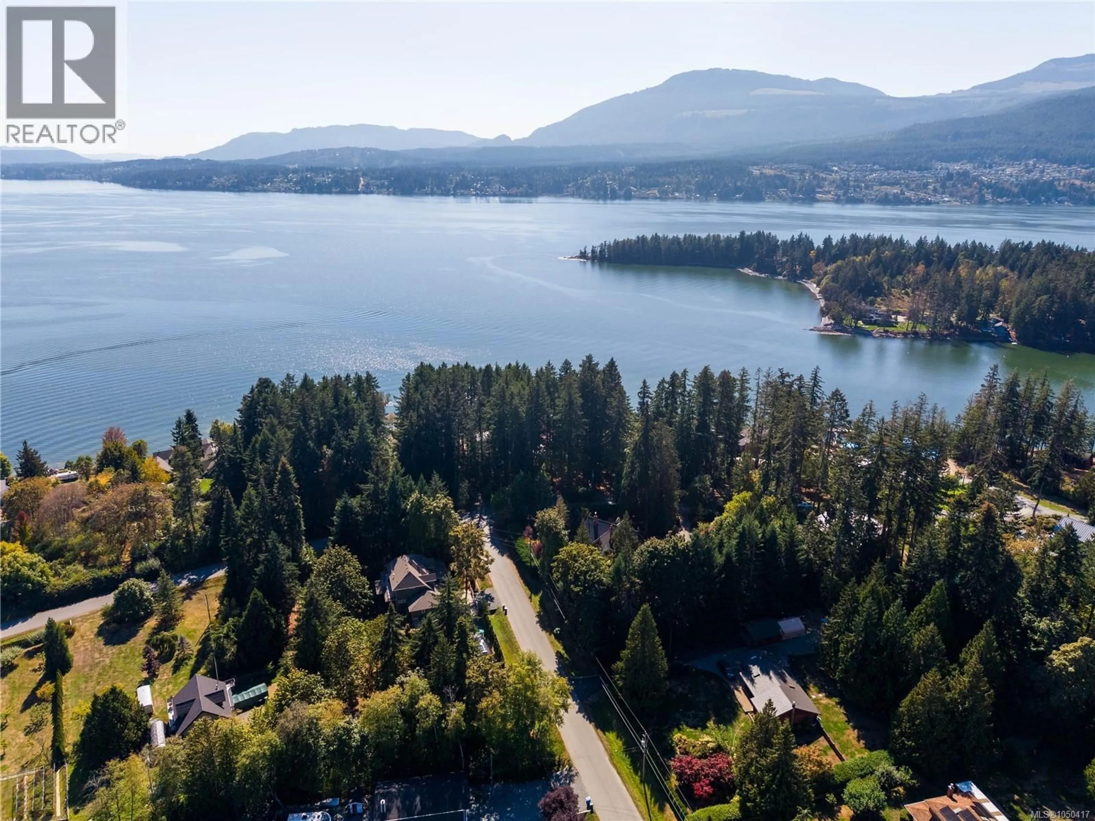 A pic from outside/outdoor area/front of a property/back of a property/a pic from drone, water/lake/river/ocean view for 3838 FEARN WAY, Ladysmith British Columbia V9G1K7