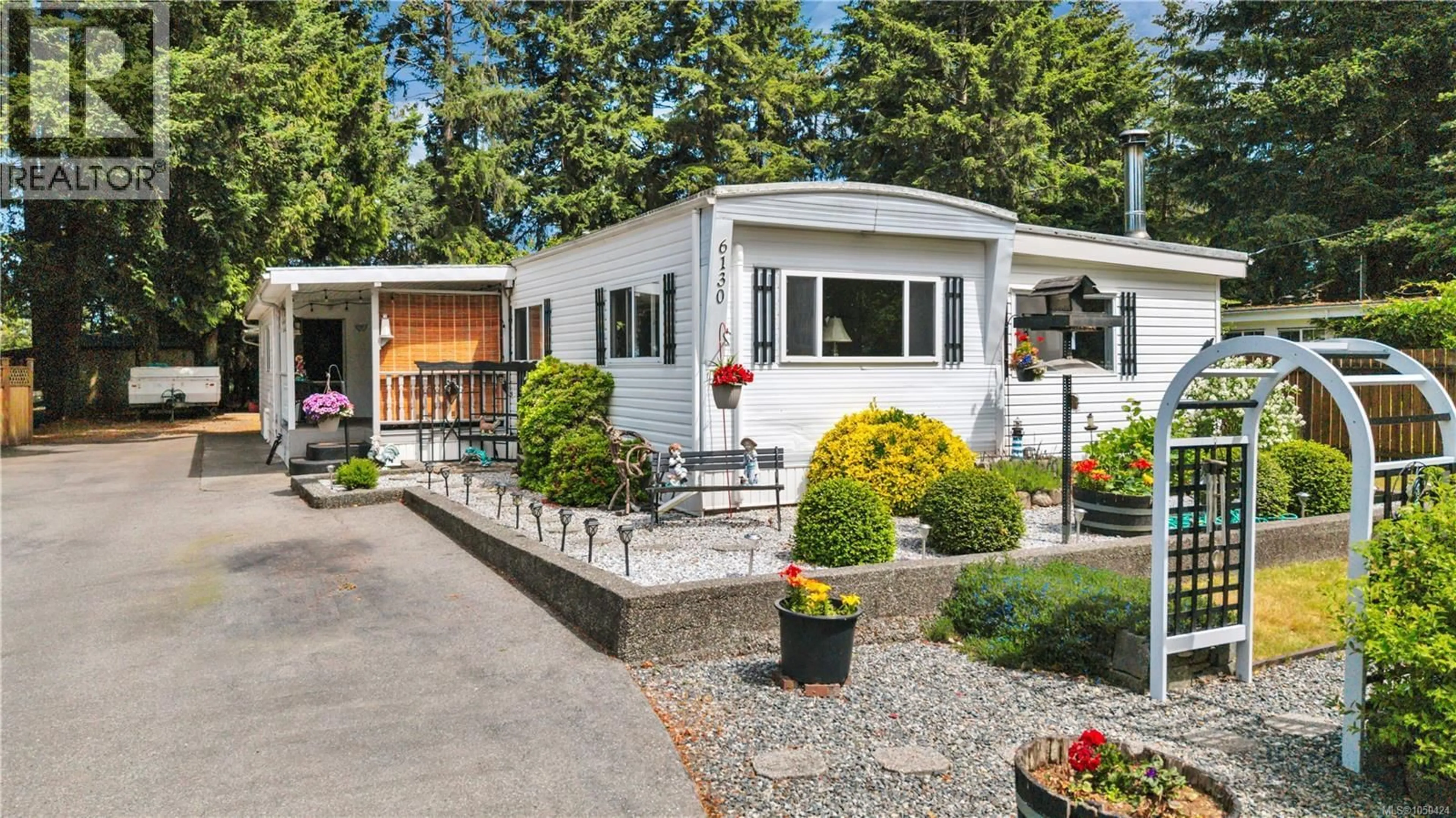 Home with vinyl exterior material, street for 6130 PINE RIDGE CRESCENT, Nanaimo British Columbia V9T2N7